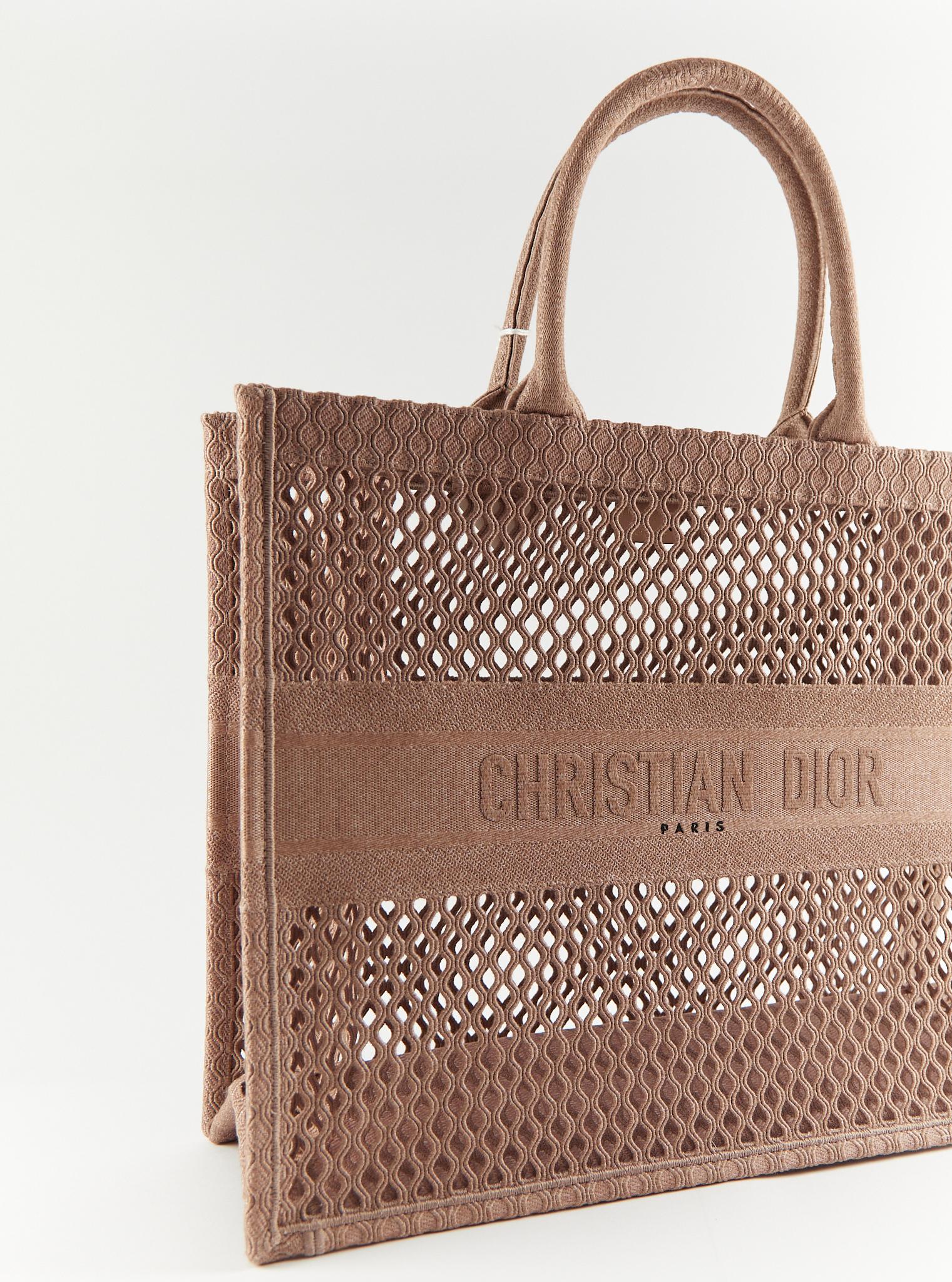 Dior Perforated Book Tote in Blush Pink 

Dimensions: W 26.5 x H 36 x 17 cm

*Comes with dustbag only