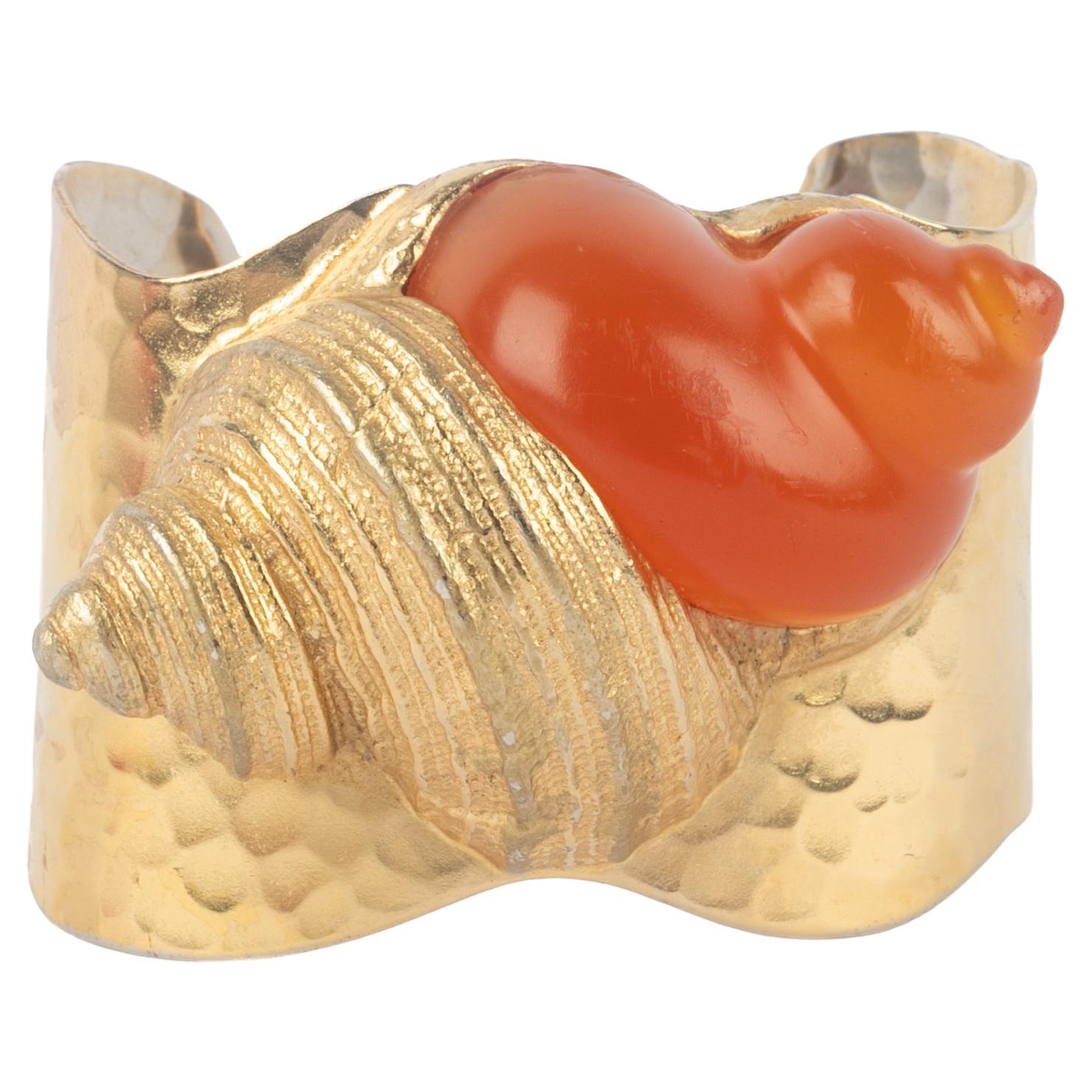 Bracciale "conchiglia" del profumo Dior in vendita