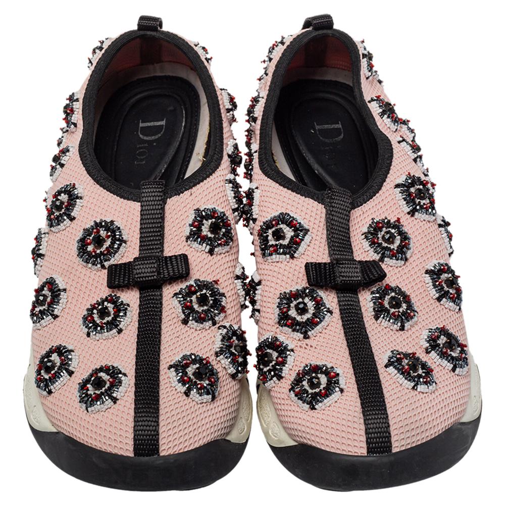 The trend set by these Fusion sneakers from Dior is one you must try. The sneakers are designed with embellishments all over and set on rubber soles that are finished with Dior branding. They are high in comfort and style, just perfect to be worn