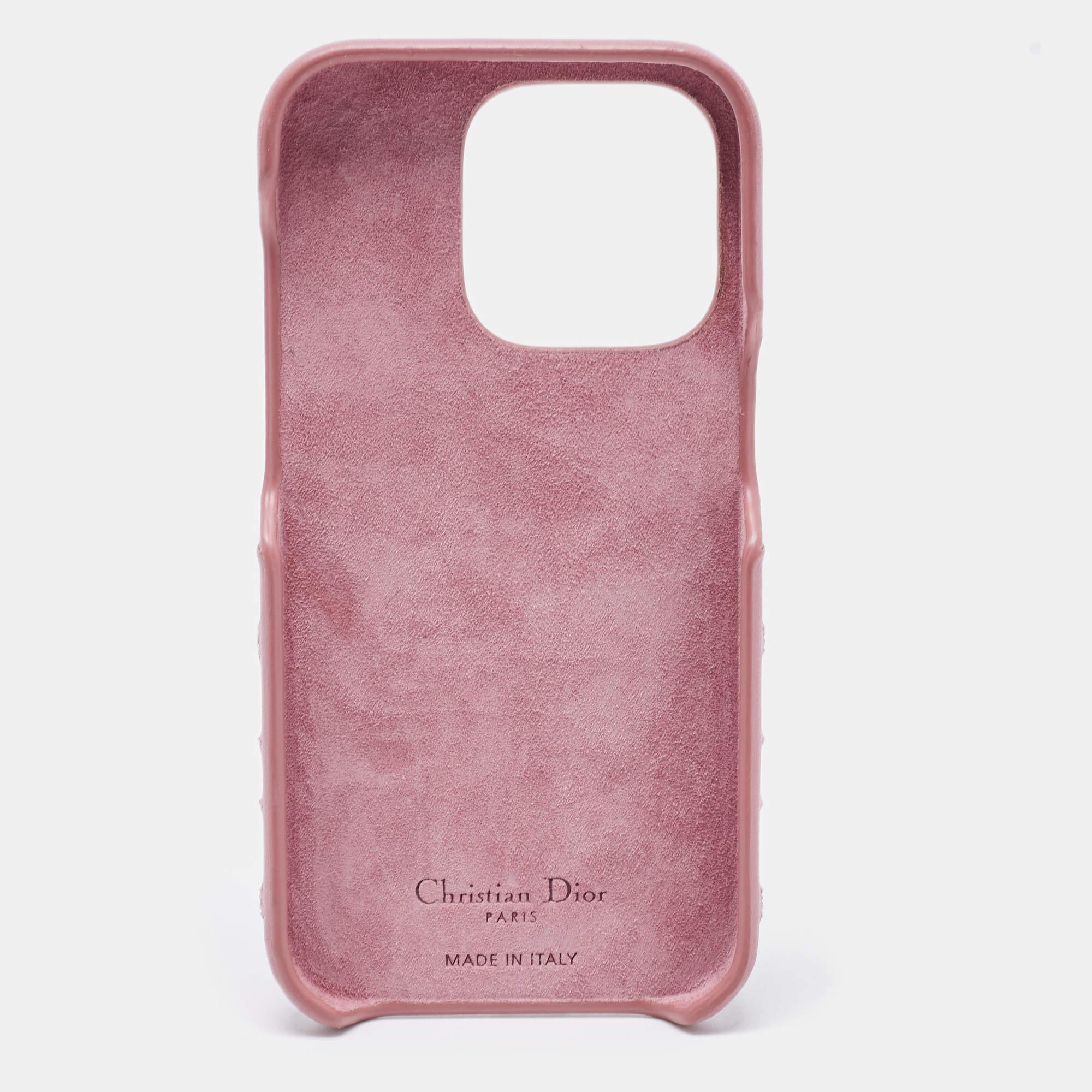 The Dior Lady Dior iPhone 14 Pro Case is a luxurious accessory crafted from high-quality pink Cannage leather. It features the iconic Lady Dior quilting pattern and is designed to protect and enhance the iPhone 14 Pro with elegance and