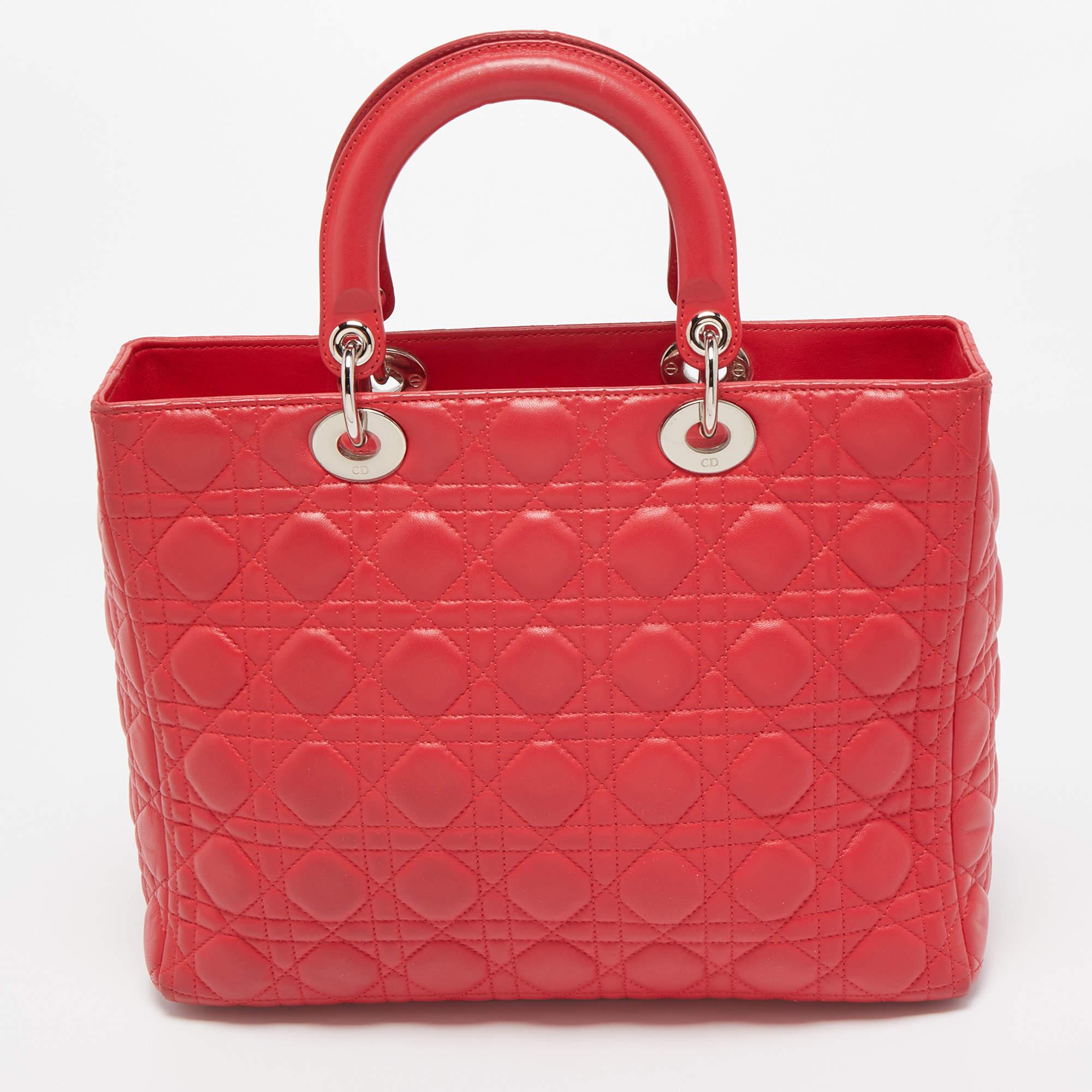 A timeless status and great design mark the Lady Dior tote. It is an iconic bag that people continue to invest in to this day. We have here this classic beauty crafted from pink Cannage leather. The bag has a lined interior for your essentials. This
