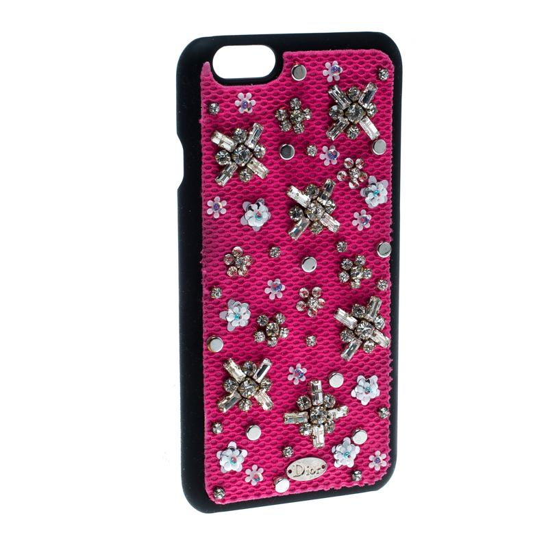 Pamper your iPhone 6 with this gorgeous case from none other than Dior. Intricately designed, the case is decked with beautiful crystal embellishments all over, with a base of pink fabric. It is crafted in plastic and features brand details in