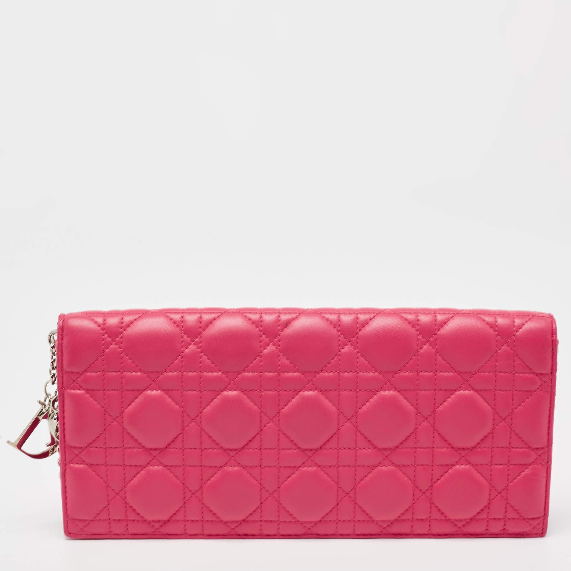 This Lady Dior pouch is designed for frequent use. Crafted from pink leather, the exterior has the Cannage quilt and flap closure. The fabric-lined interior houses a slip pocket.

Includes: Original Dustbag, Detachable Chain Strap

