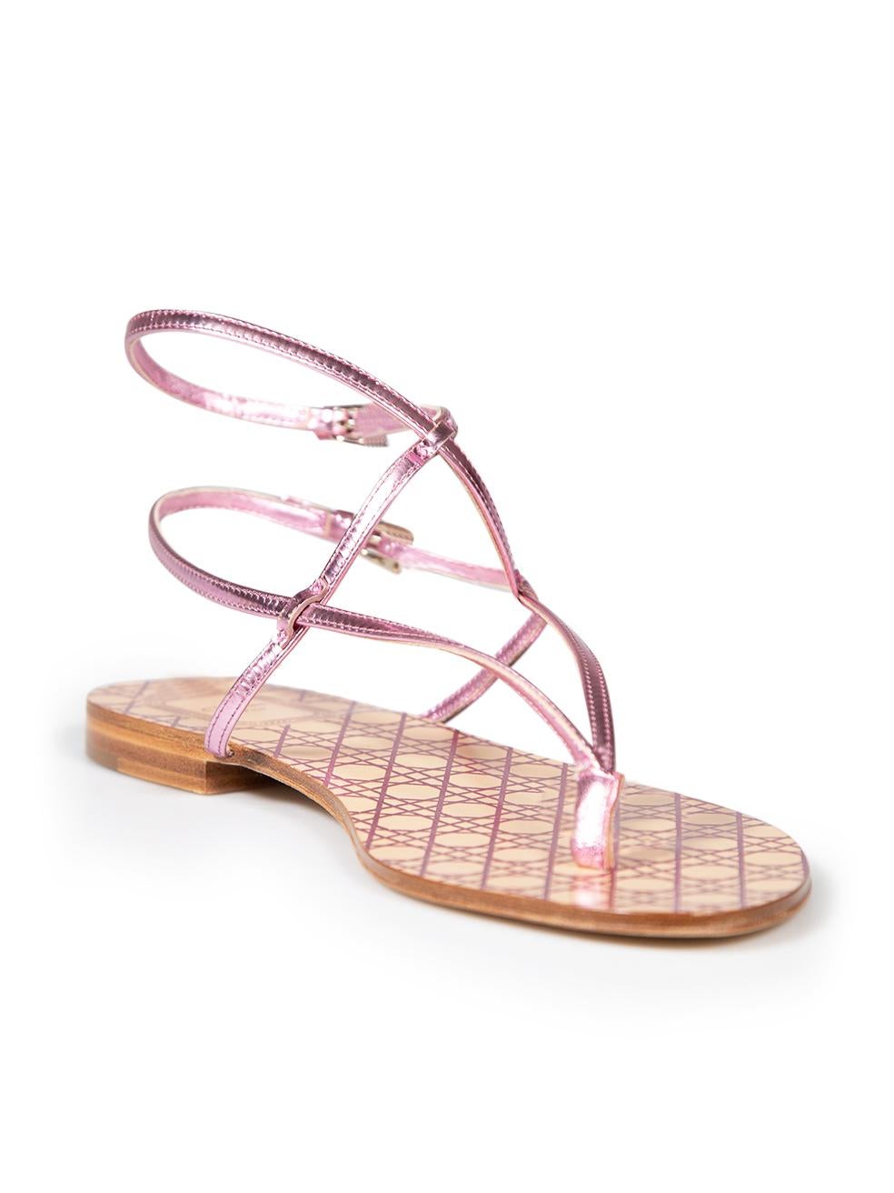 CONDITION is Very good. Minimal wear to sandals is evident. Minimal indent to tip of left sole on this used Dior designer resale item. This item comes with original dust bag.
 
 
 
 Details
 
 
 Pink
 
 Leather
 
 Thong sandals
 
 Open toe
 
