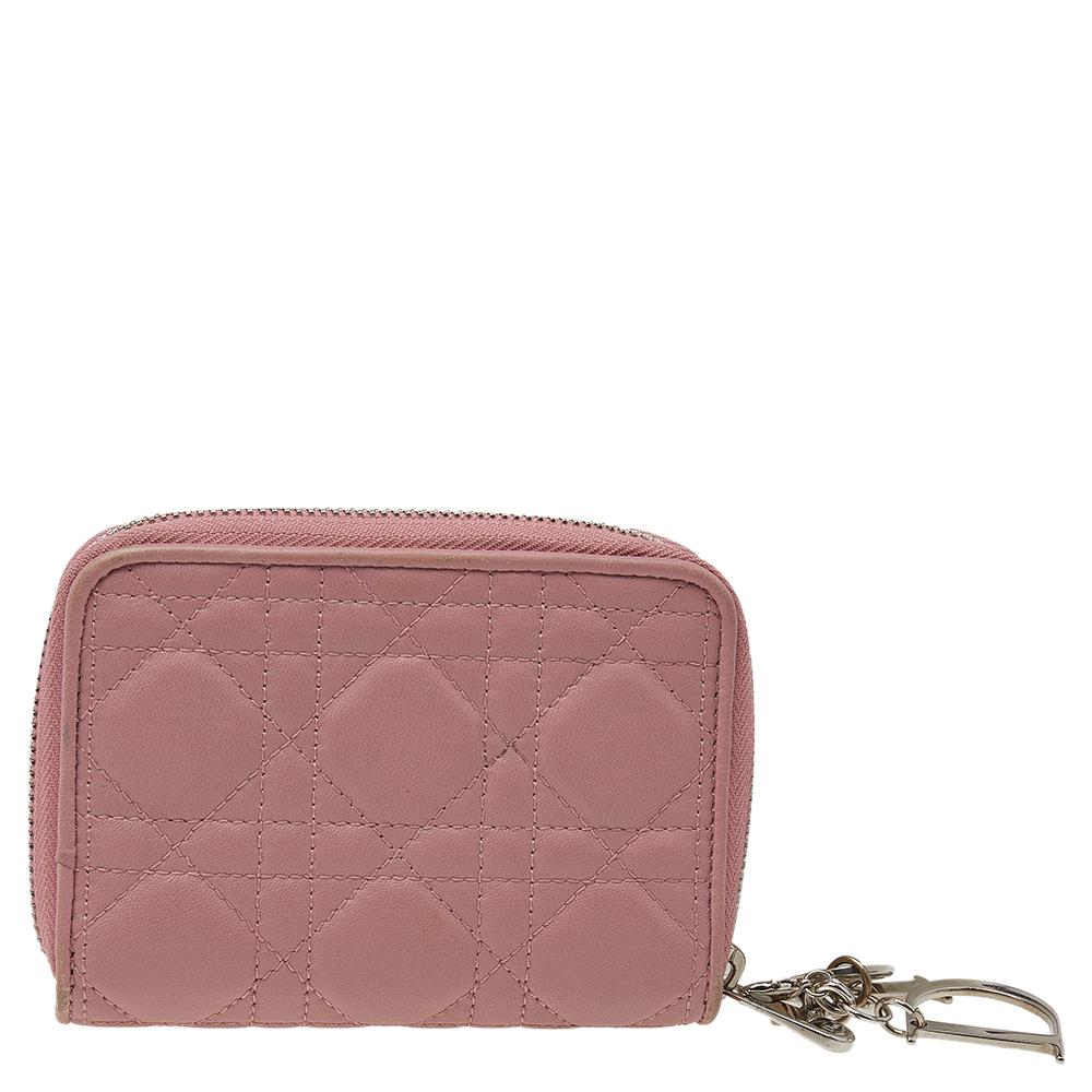 Crafted from leather, this Lady Dior card case opens to reveal multiple compartments to carry your cards neatly. It also features the brand's iconic Cannage quilt detailed on the exterior. This pink card case is durable and can easily be carried. It