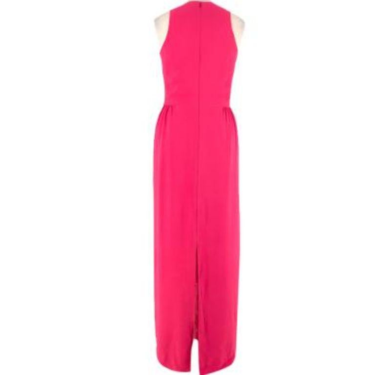 Dior Pink Silk Sleeveless Gown

- Sleeveless pink gown with flattering deep v-neckline 
- Pleated waist with wrap over effect and sheer pink panel underneath
- Slit at the back with sheer pink panel 
- Hidden zip down the back 

Made in France 
95%