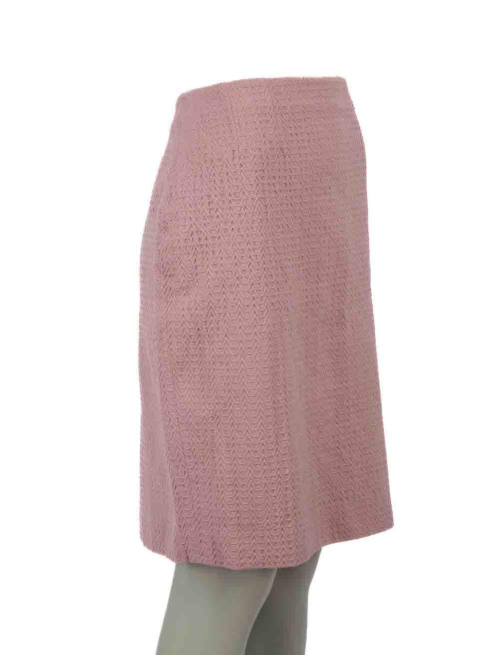CONDITION is Very good. Minimal wear to skirt is evident. Minimal wear to back of lining where stains is evident and the lining seam is partially unstitched on this used Dior designer resale item.
 
Details
Pink
Wool
Pencil skirt
Knee length
Back