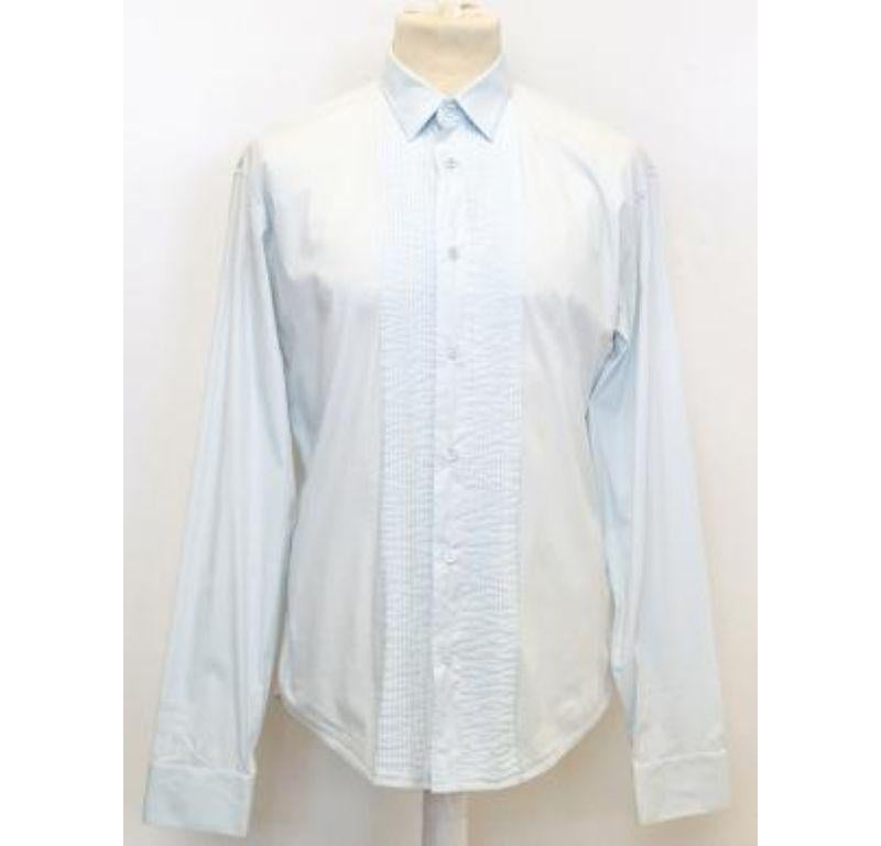 Light blue, pleated dress shirt, never worn without tags, perfect condition. 10/10. Size 40.
