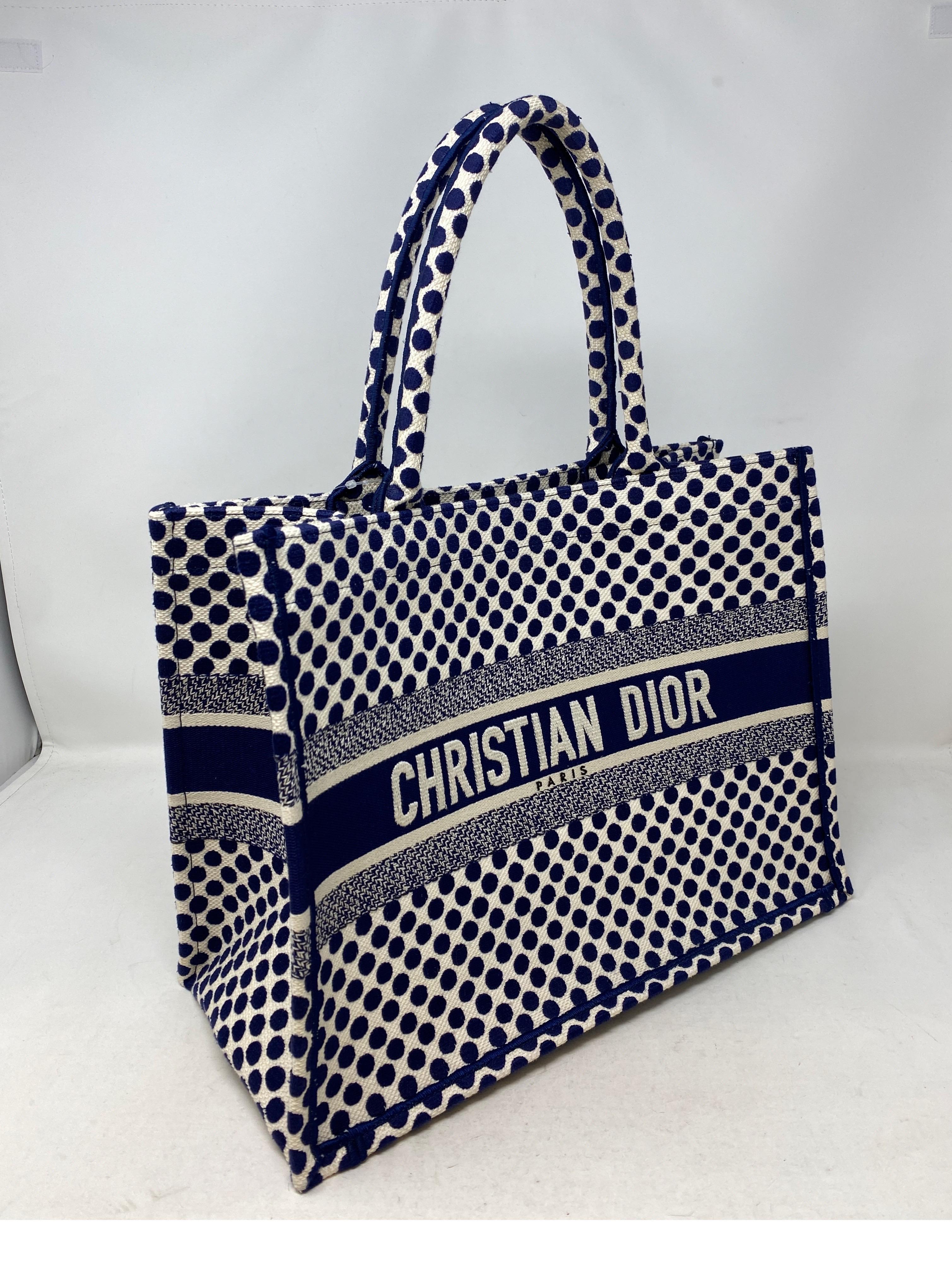 Dior Polka Dot Tote Bag. Rare polka dots. Navy and white. Medium size tote bag. Most wanted style by Dior. Excellent like new condition. Guaranteed authentic. 