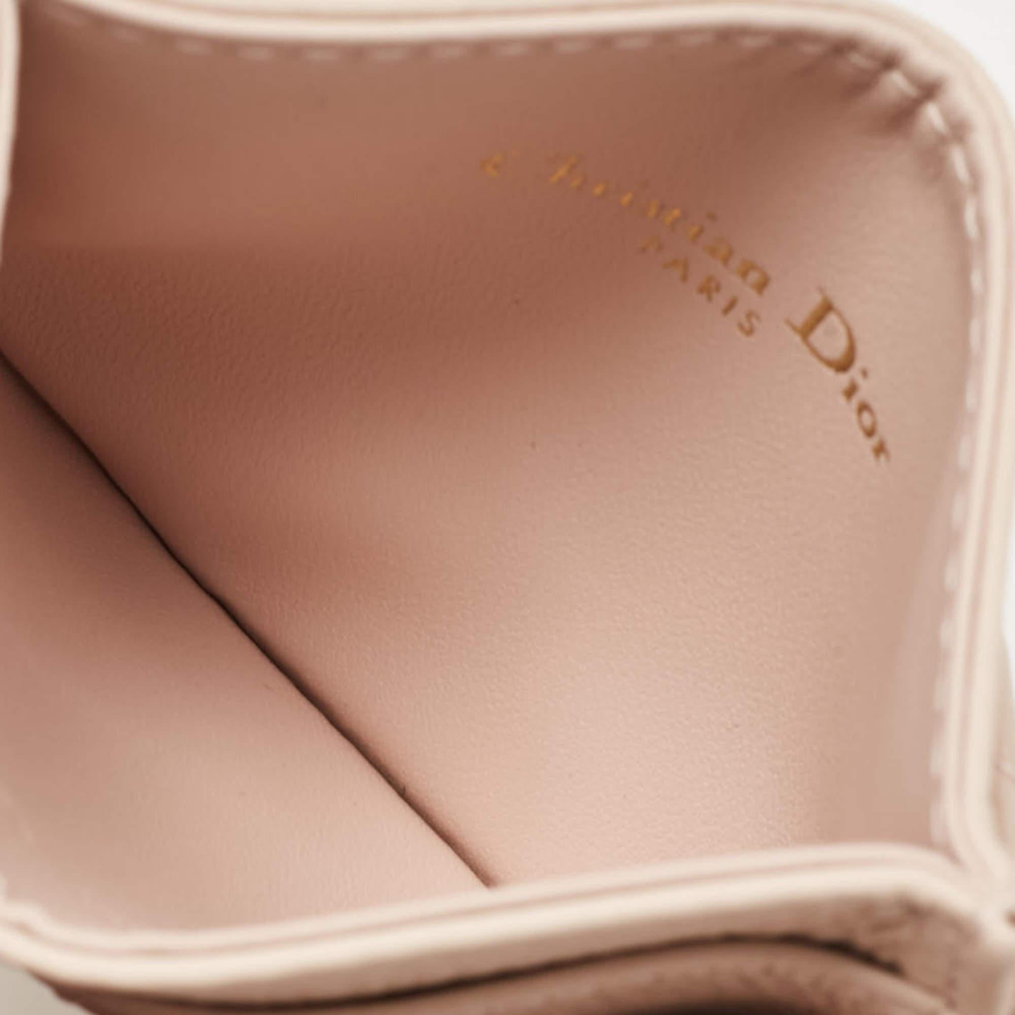 This stylish and functional cardholder is a must have in your collection. It is equipped with multiple  well lined slots to hold your cards.