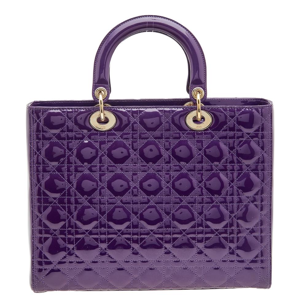The Lady Dior tote is a Dior creation that has gained recognition worldwide and is today a coveted bag that every fashionista craves to possess. This purple tote has been crafted from patent leather and it carries the signature Cannage quilt. It is