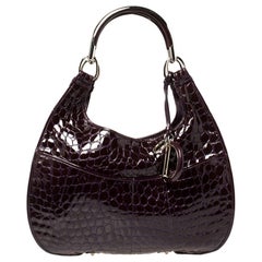 Dior Fourre-tout 61 en cuir verni gaufré croco violet