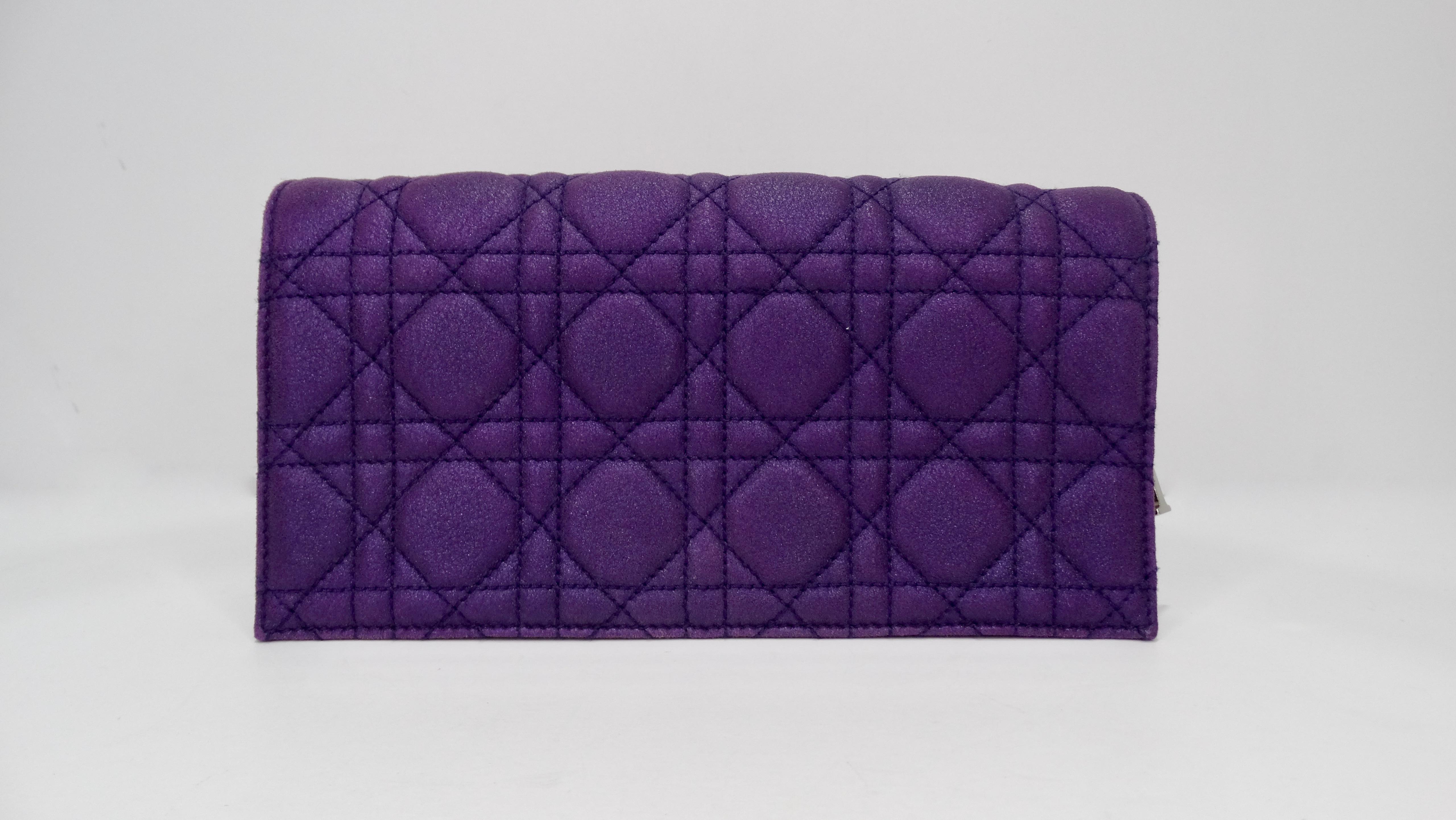 How sweet is this Dior clutch?! This adorable Dior clutch features a beautiful purple quilted material with a double silver chain strap, and a silver Dior Charm. The inside features a stunning purple satin. The perfect addition for a night out! Pair