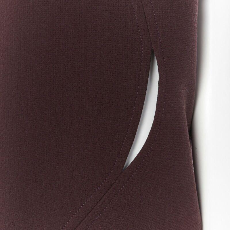 DIOR RAF SIMONS maroon brown virgin wool panel slit cut-out top bottom set FR38
Reference: CC/AAWG00298
Brand: Dior
Designer: Raf Simons
Color: Brown
Pattern: Solid

CONDITION:
Condition: Very good, this item was pre-owned and is in very good