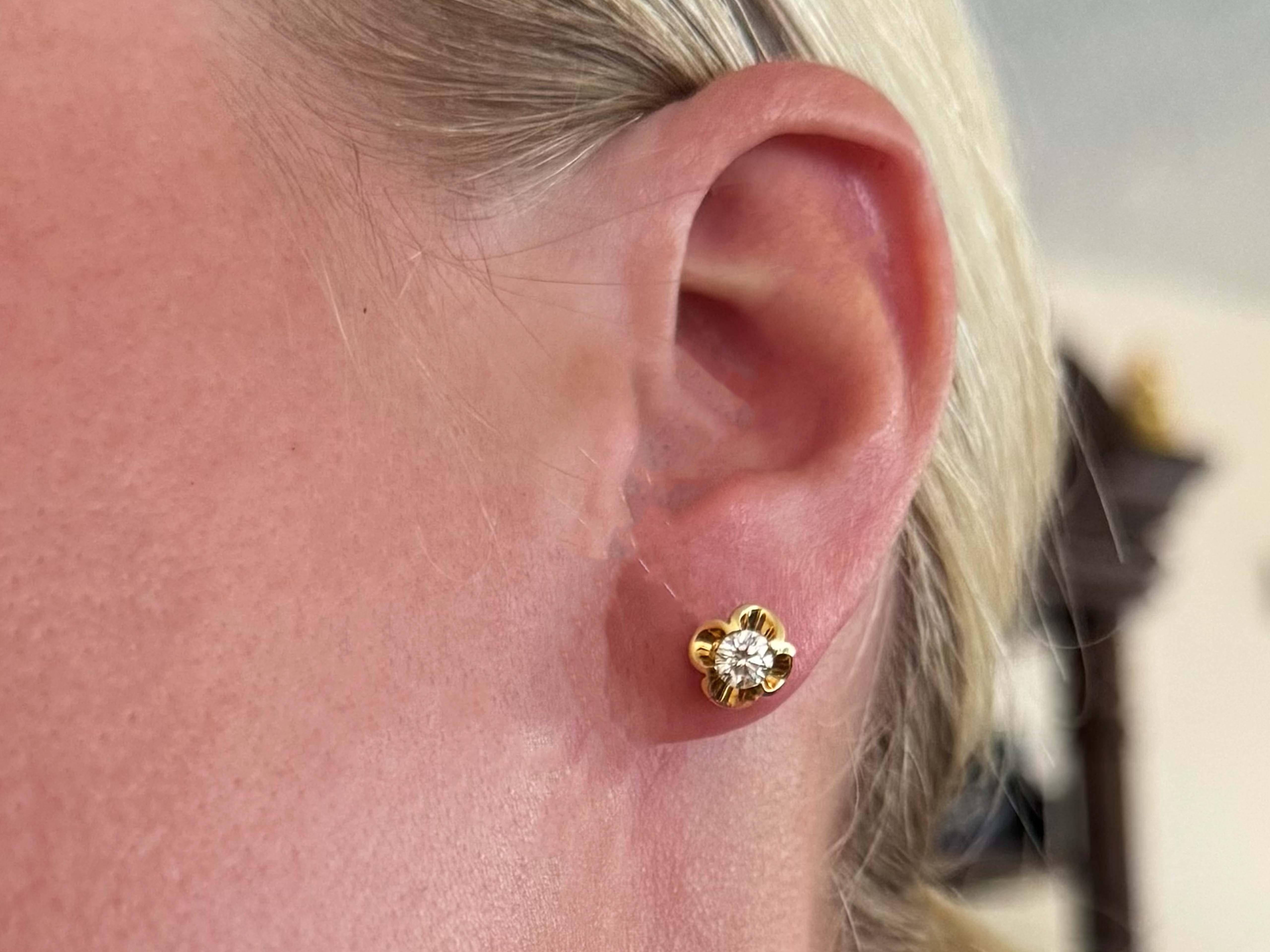 Earrings Specifications:

Designer: DIOR

Metal: 18k Yellow Gold

Total Weight: 2.7 Grams

Diamond Count: 2 brilliant cut diamonds

Diamond Carat Weight: ~0.60 carats

Diamond Color: D-F

Diamond Clarity: VVS1-VS1

Condition: Preowned,
