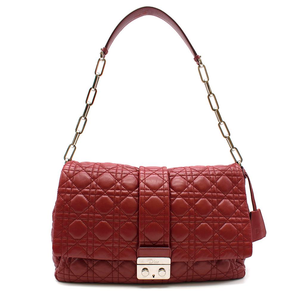 Dior Red Cannage Leather New Lock Flap Bag

This Dior flap bag 
Red shade
Cannage pattern 
single handle
silver-tone front lock. 
fabric-lined interior
Silver hardware
Dior logo on silver hardware

Please note, these items are pre-owned and may show