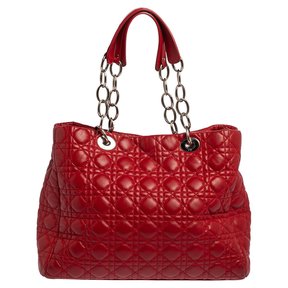 The shopper tote to buy today is this one by Dior! Crafted with expertise, the Lady Dior tote has the signature Cannage pattern on leather, two chain-leather handles on top, a spacious fabric interior, and brand letter charms.