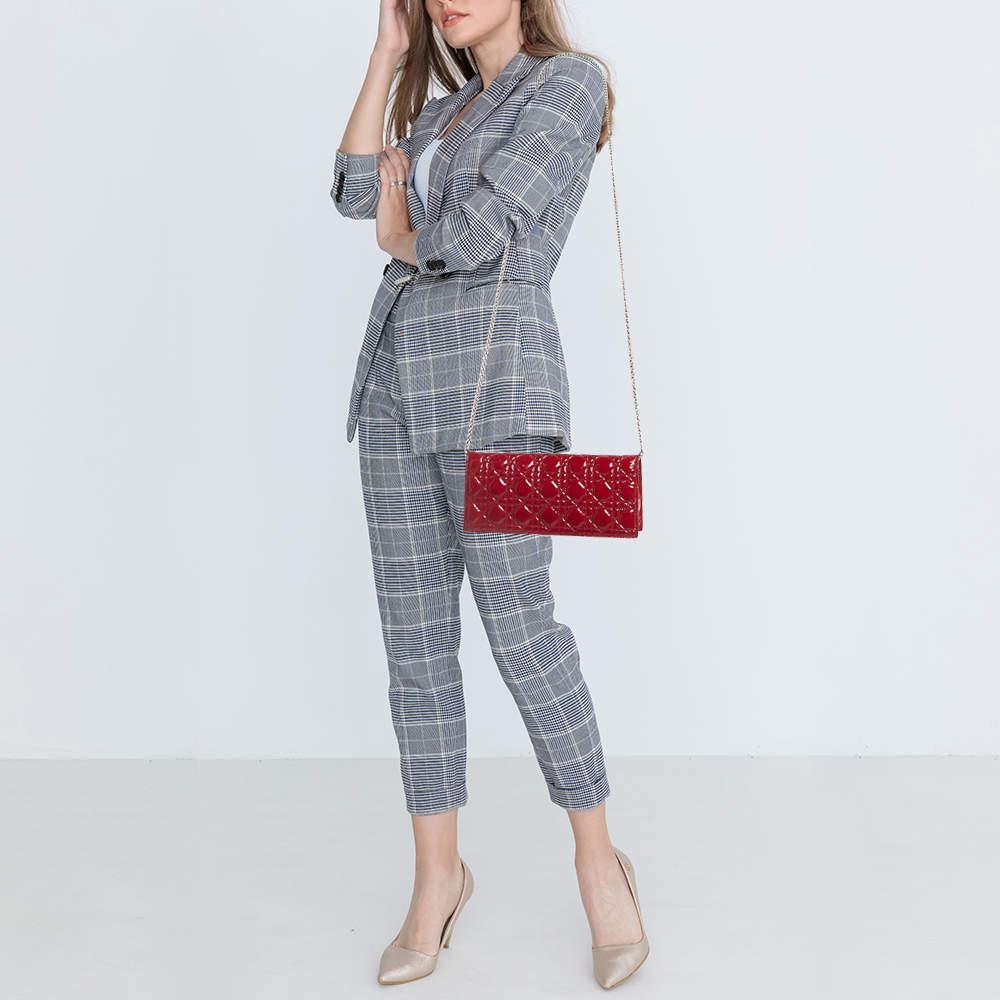 Due to detailed and innovative designs, Dior has managed to be at the top of fashion's hierarchy through the years. Infuse the signature aesthetics of the brand into your outfit by accessorizing it with this Lady Dior clutch. With a classic design,