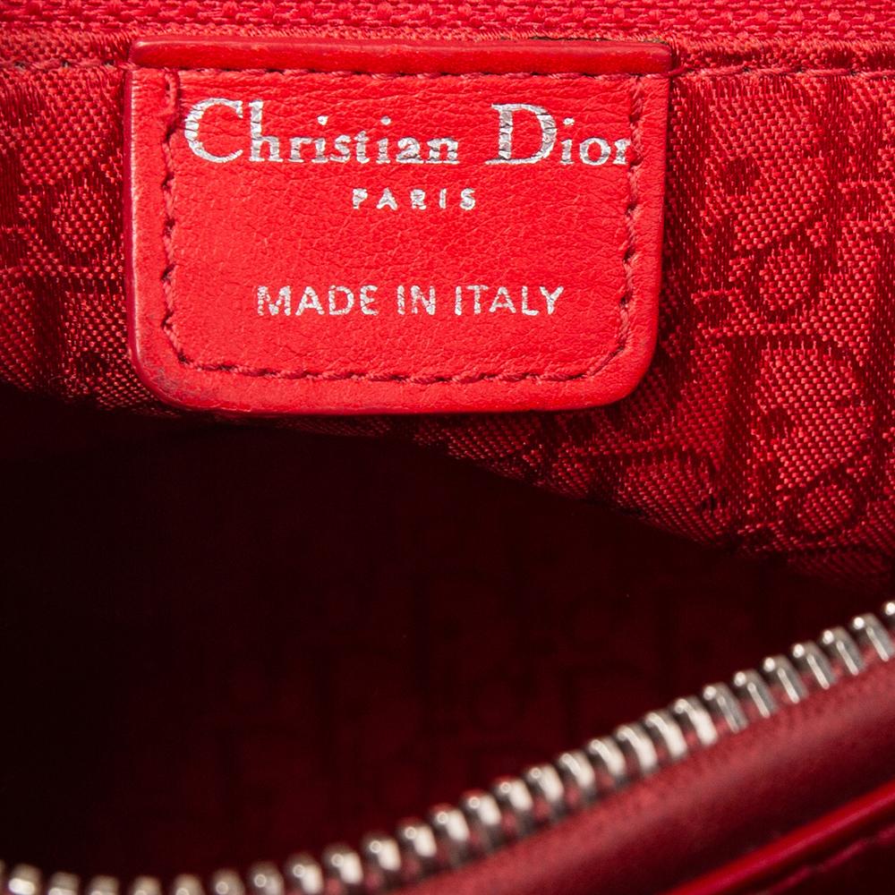 The Lady Dior tote is a Dior creation that has gained recognition worldwide and is today a coveted bag that every fashionista craves to possess. This red tote has been crafted from patent leather and it carries the signature Cannage quilt. It is