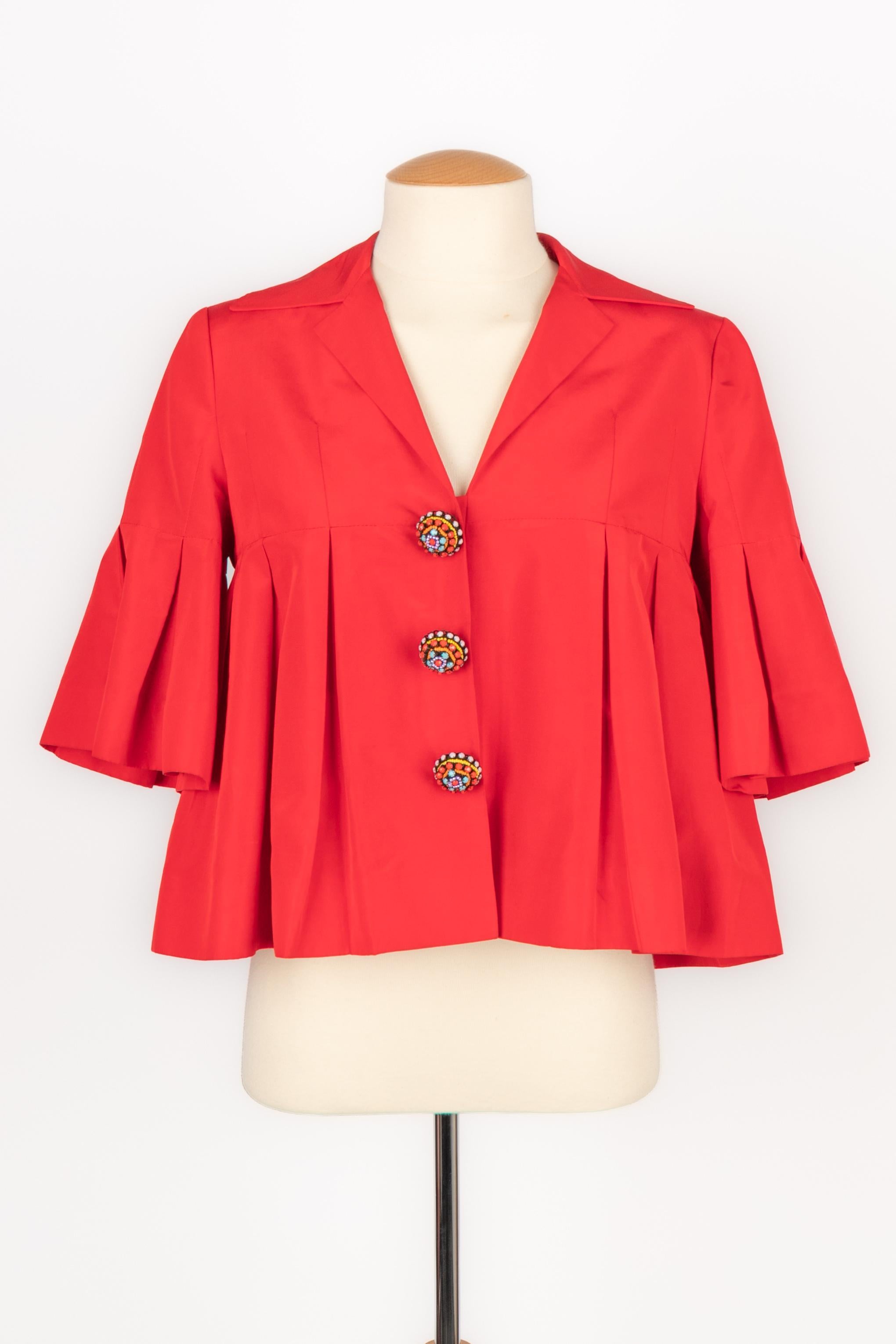 DIOR - (Made in Italy) Red cotton jacket with rhinestoned and beaded buttons. Size 36FR. 2008 Spring-Summer Collection under the artistic direction of John Galliano.

Condition:
Very good condition

Dimensions:
Shoulder width: 36 cm - Sleeve length: