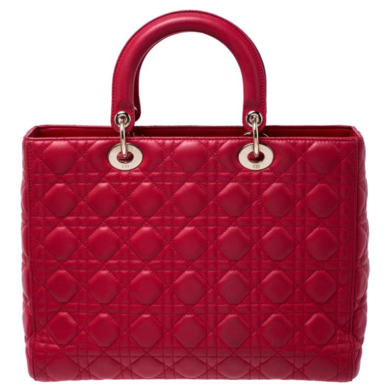 The Lady Dior tote is a Dior creation that has gained recognition worldwide and is today a coveted bag that every fashionista craves to possess. This red tote has been crafted from leather and it carries the signature Cannage quilt. It is equipped