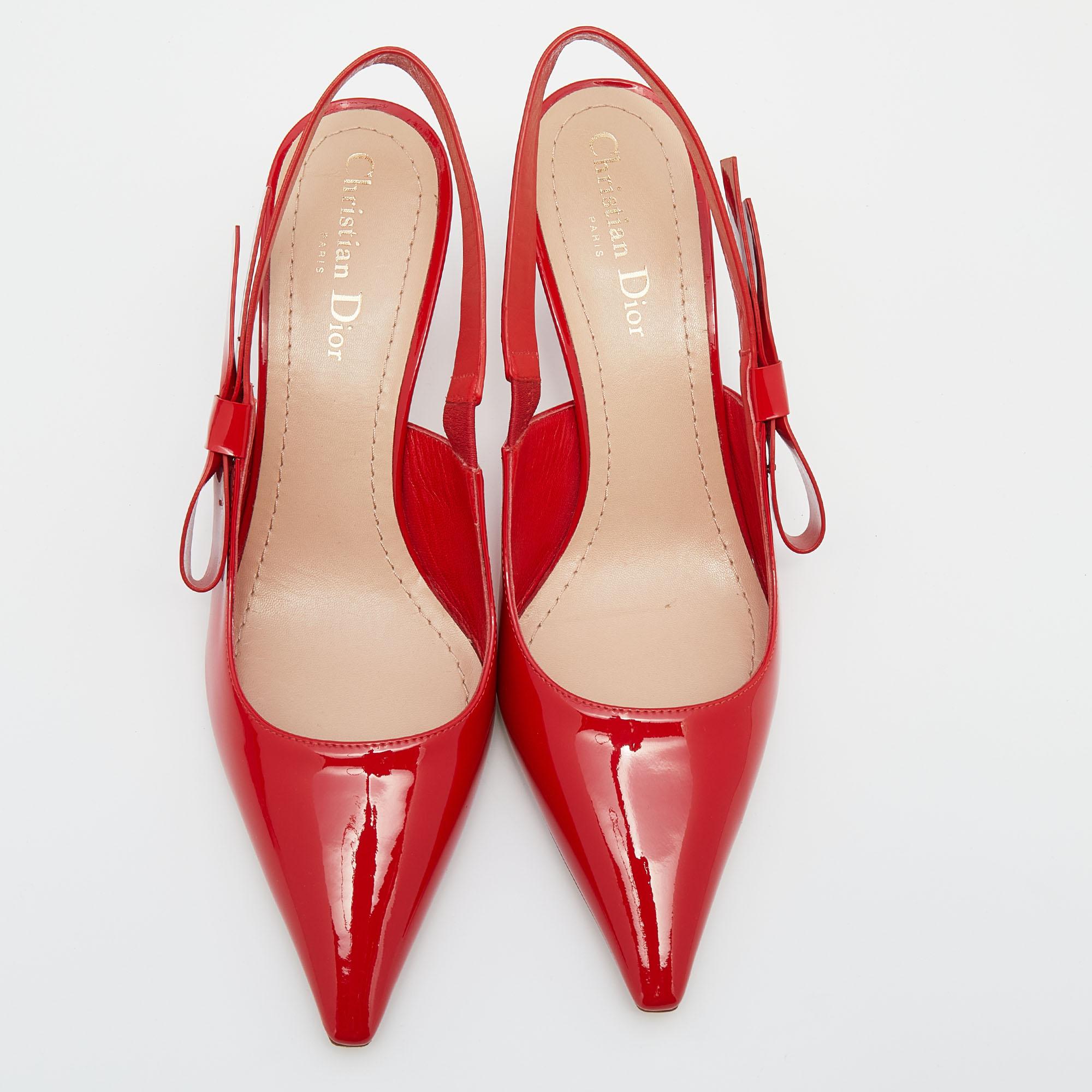 A coveted Dior silhouette that's loved by women around the world. These red Dior sandals in patent leather are styled with pointed toes and slingbacks. They are complete with comfortable leather insoles and curved heels.

Includes: Original Dustbag
