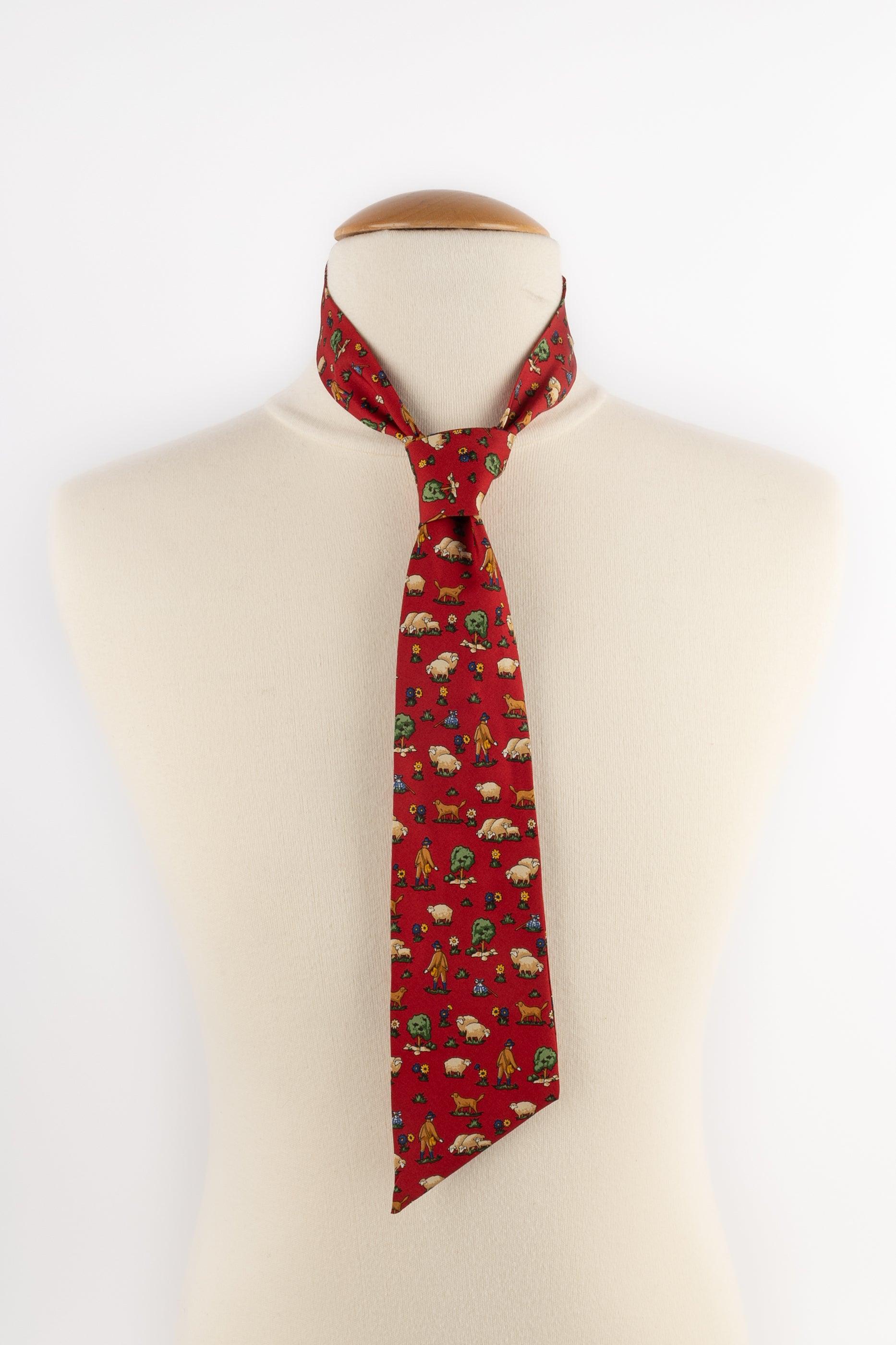 DIOR - (Made in France) Red silk twill Mitzah illustrated with sheeps and shepherds.

Additional information:
Condition: Very good condition
Dimensions: Length: 117 cm - Width: 8 cm

SKU:FFD12