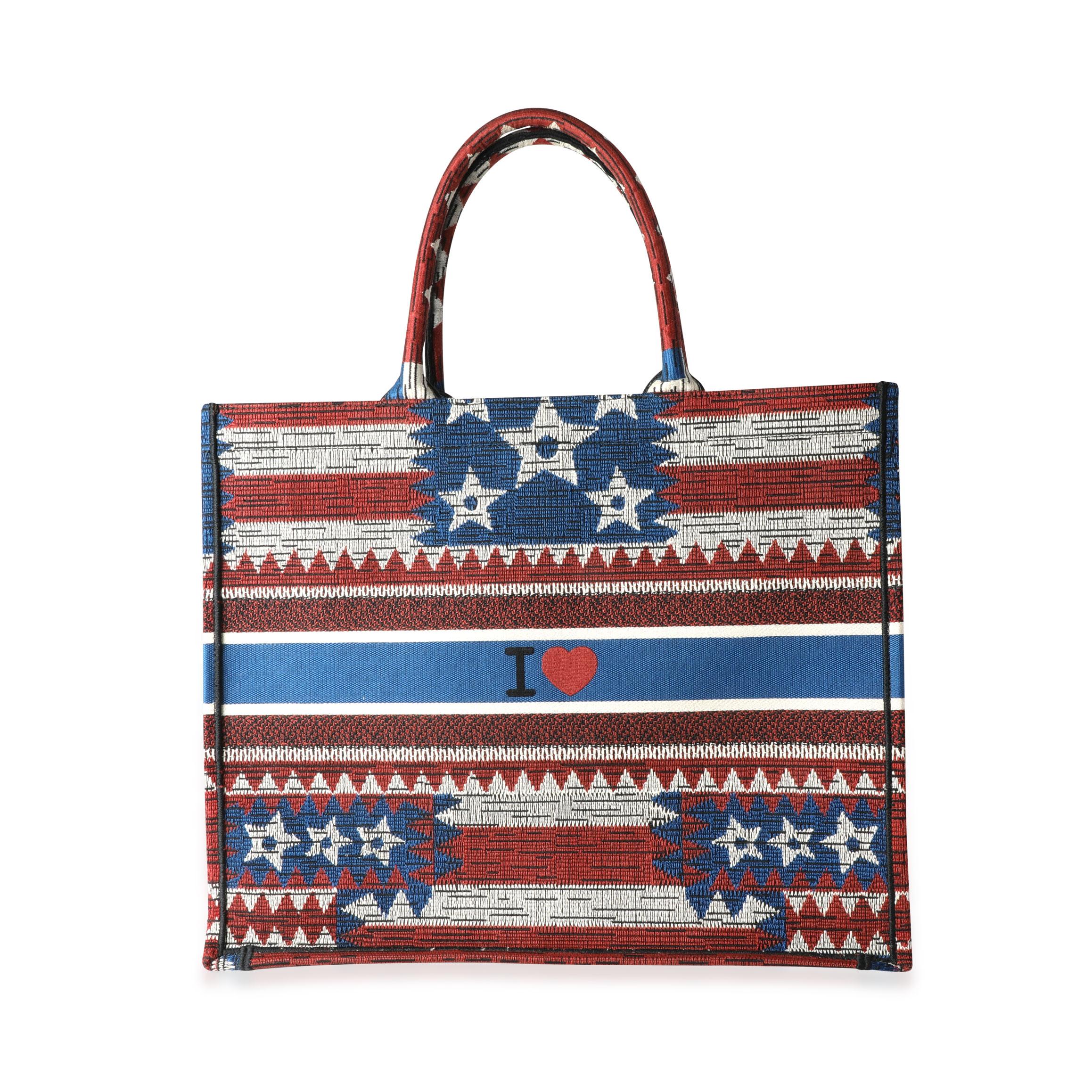 Listing Title: Dior Red, White, & Blue American Flag Large Book Tote
SKU: 114883
MSRP: 3000.00
Condition: Pre-owned (3000)
Handbag Condition: Excellent
Condition Comments: Excellent Condition. Light fraying to fabric. No other visible signs of