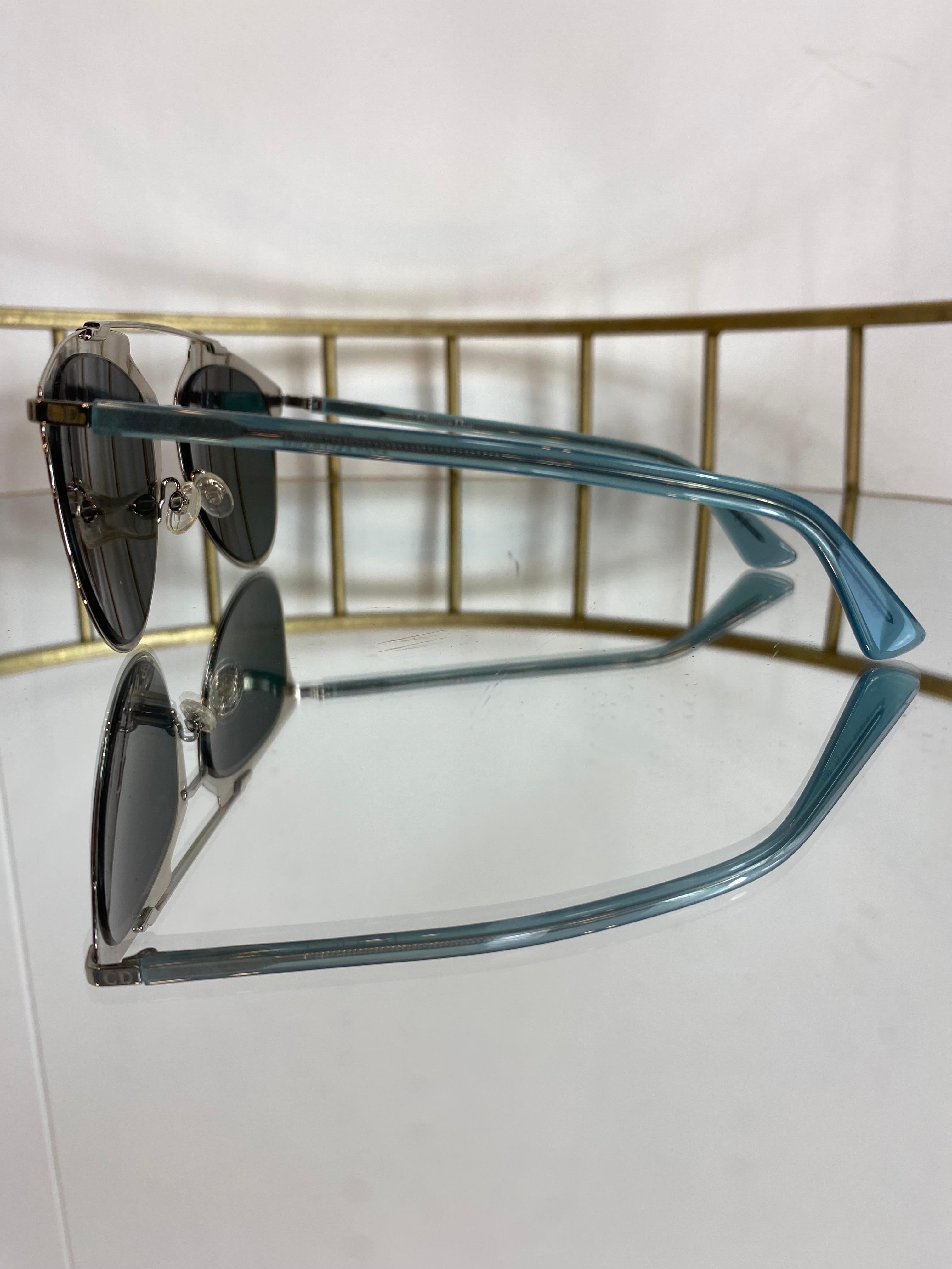 Dior Reflected metallic sunglasses. Multicolored frame. 
Mirrored lenses. 
In perfect condition. 
Width 14 cm 
Height 5.5 cm 
Length of temples 14 cm
