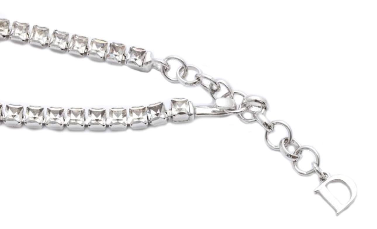 Description: Beautiful Christian Dior by John Galliano rhinestone choker necklace.

Period: Circa 2000
Specifications: Chain length: 14.2, Charm Width: 1.2, Charm Height: 1.2 inches
