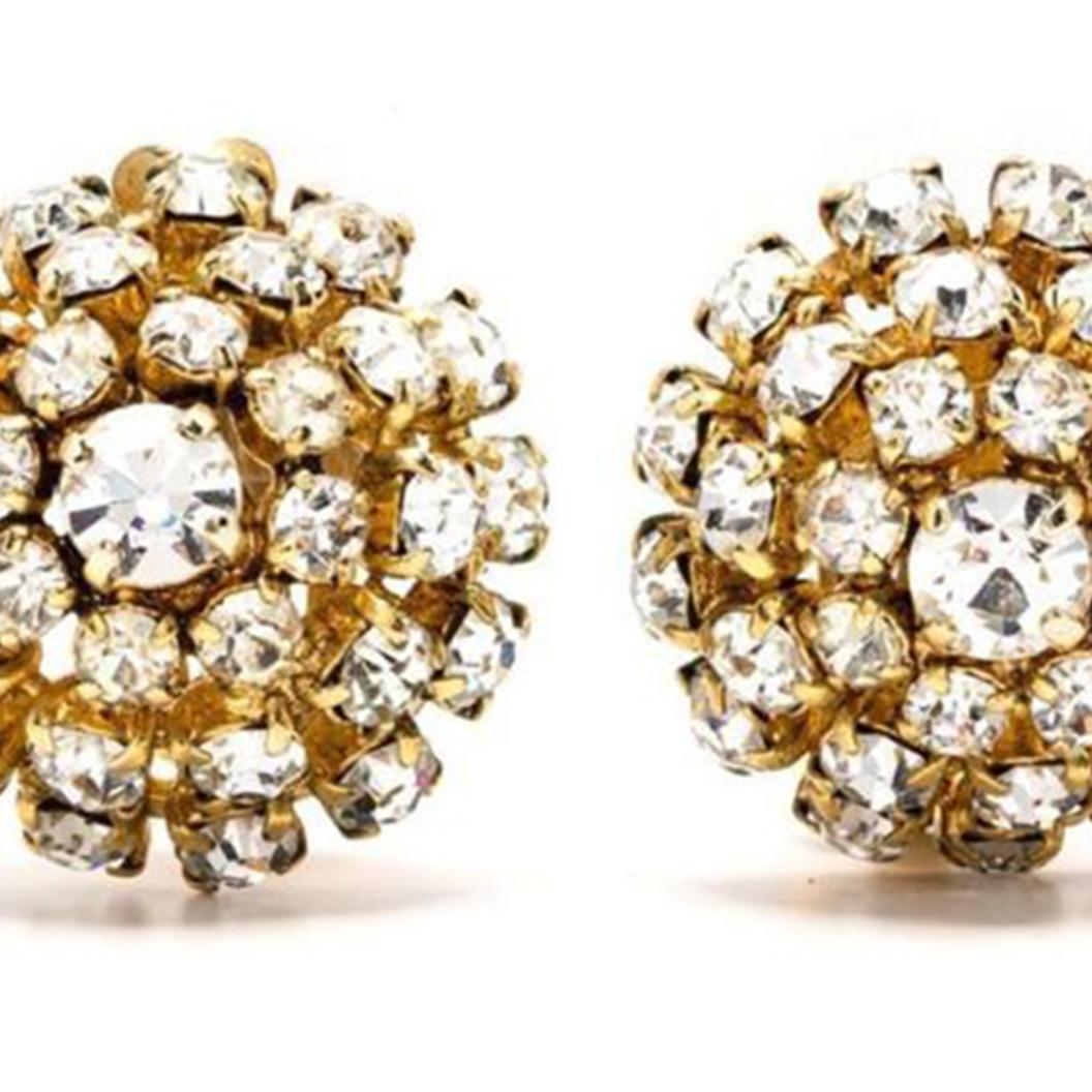 Designed by Grosse for Christian Dior, these vintage pre-owned earrings display rows of rhinestones designed to look like petals. Secured using a clip-on fastening, these stunning earrings can be enjoyed by everyone, pair with the matching brooch