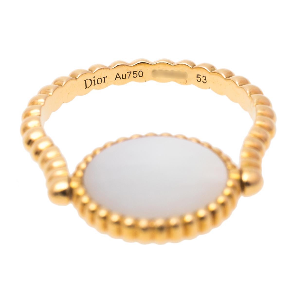 Dior's 'Ros Des Vents' ring is an eye-catching number that is sure to attract a lot of attention. It features an 18k yellow gold beaded band and centered with the signature motif detailed with a star shape topped with a diamond and inlaid with