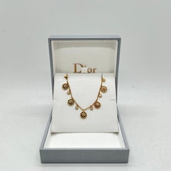 Bracciale Dior Rose des Vents in oro giallo 18 carati, con diamanti e pietre preziose di vari tipi, dal design a motivi multipli
