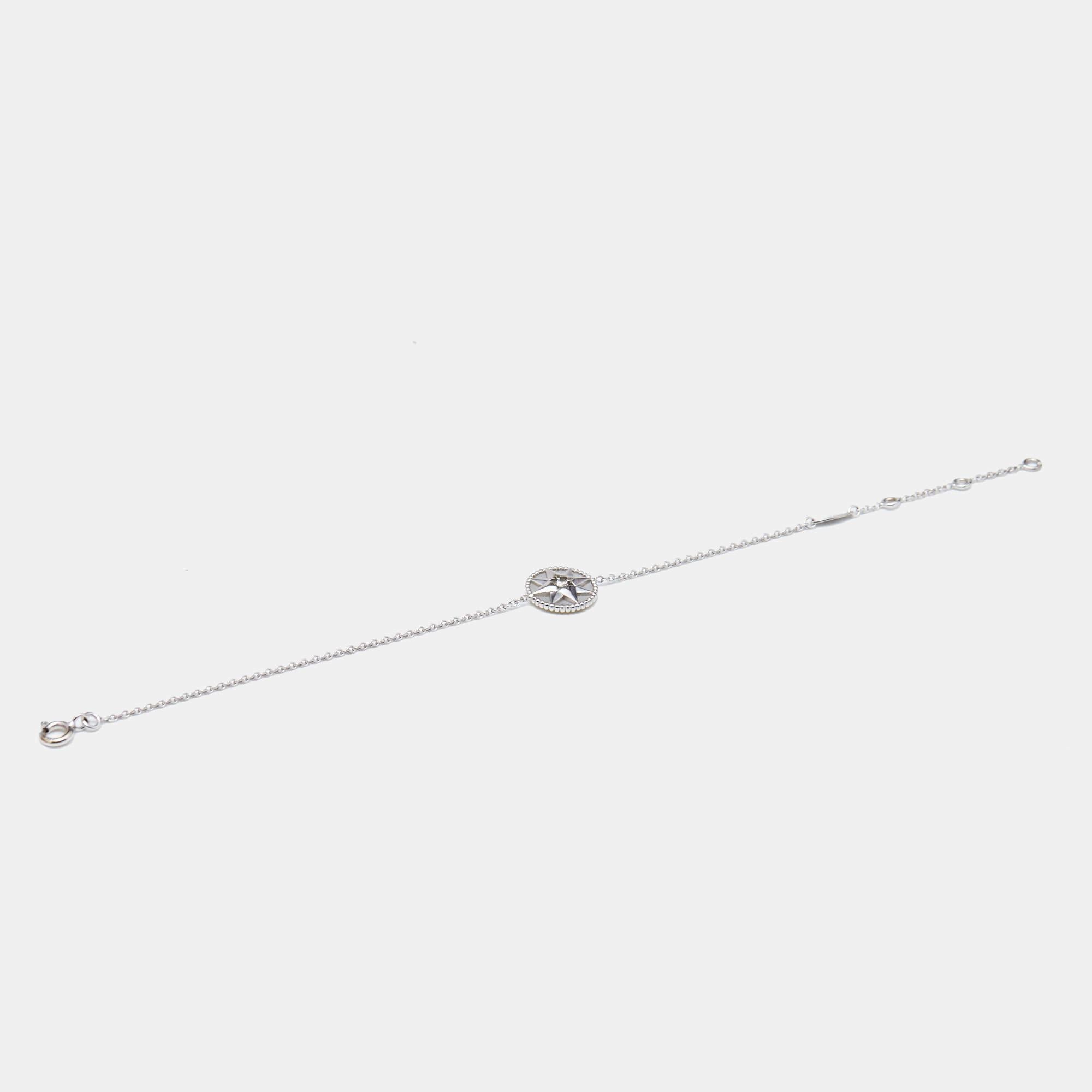 Dior brings this fabulous Rose Des Vents bracelet rendered in an elegant silhouette for the woman who is ready to ace every accessory game. It is sure to catch an eye and make your heart skip a beat. Flaunt it with your all looks from formal to