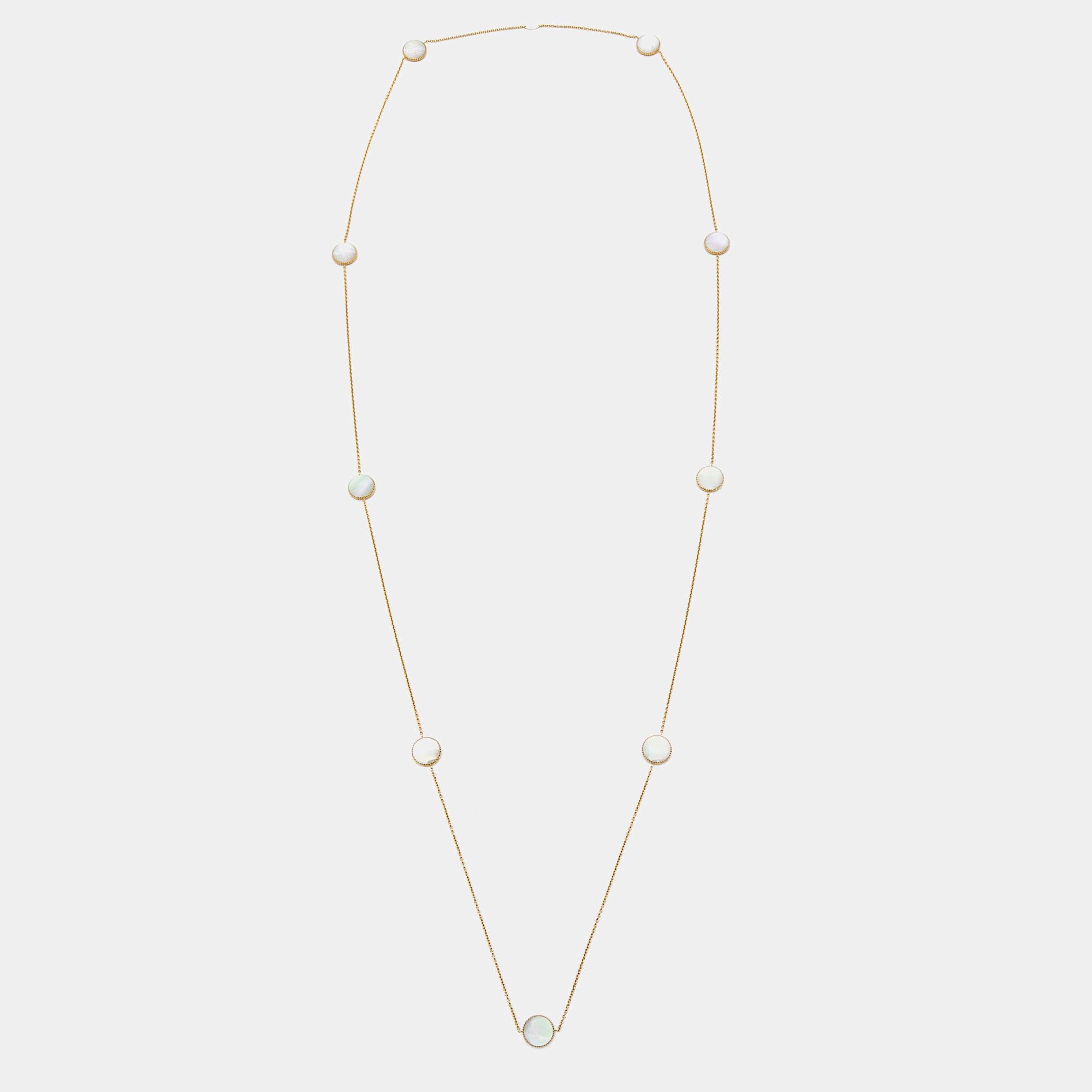 Crafted with exquisite precision, the Dior Rose Des Vents necklace exudes opulence. Delicate 18k yellow gold intertwines with lustrous mother of pearl and radiant diamonds, creating a mesmerizing tapestry of luxury. Its elongated design adds a touch