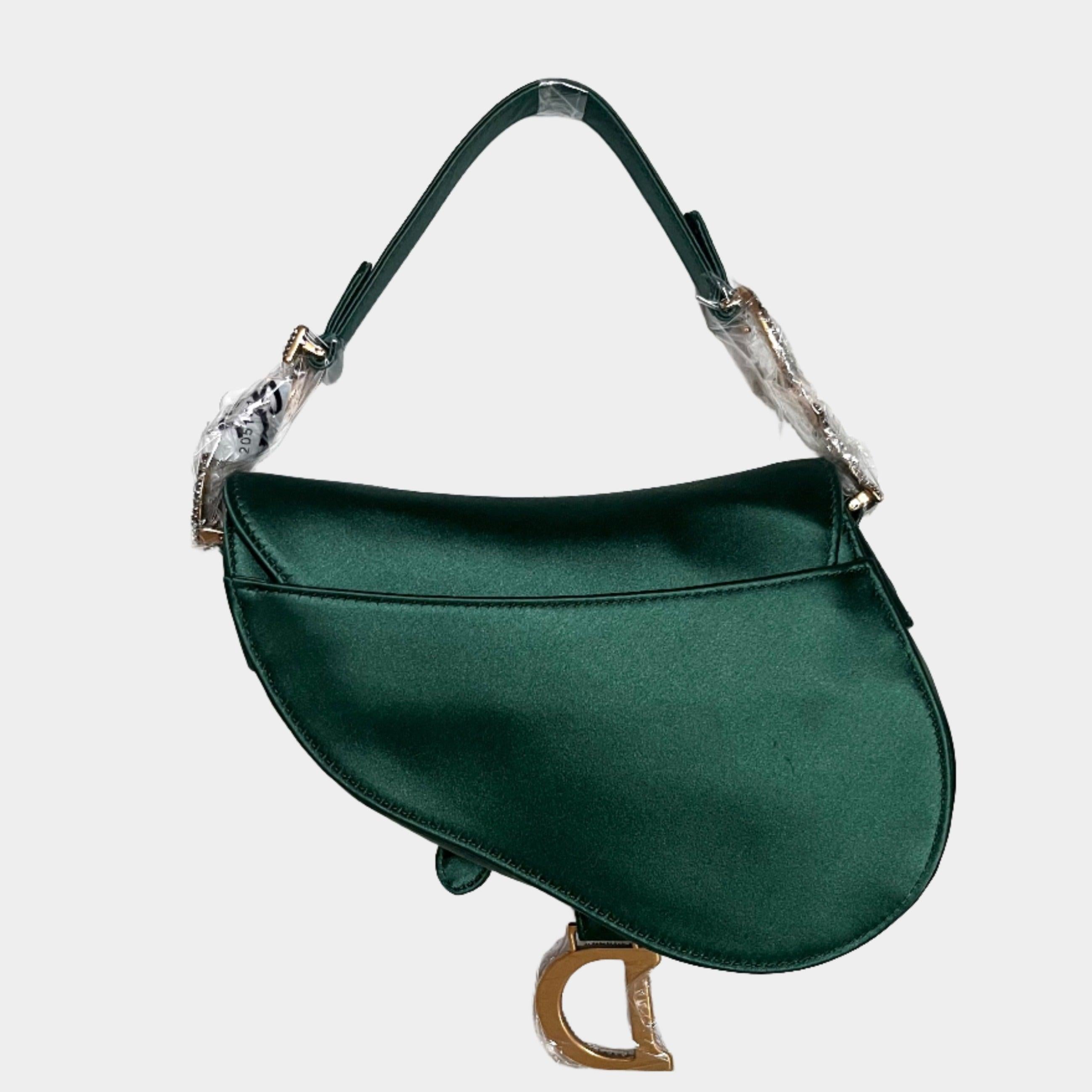 Dior Saddle Mini 2019 Silk Emerald Green with crystals These are professional photos of the actual bag offered by Luxbags. 2019 Dior Saddle bag, crafted in Emerald Green silk satin, the legendary design comes in size mini, features a magnetic flap,
