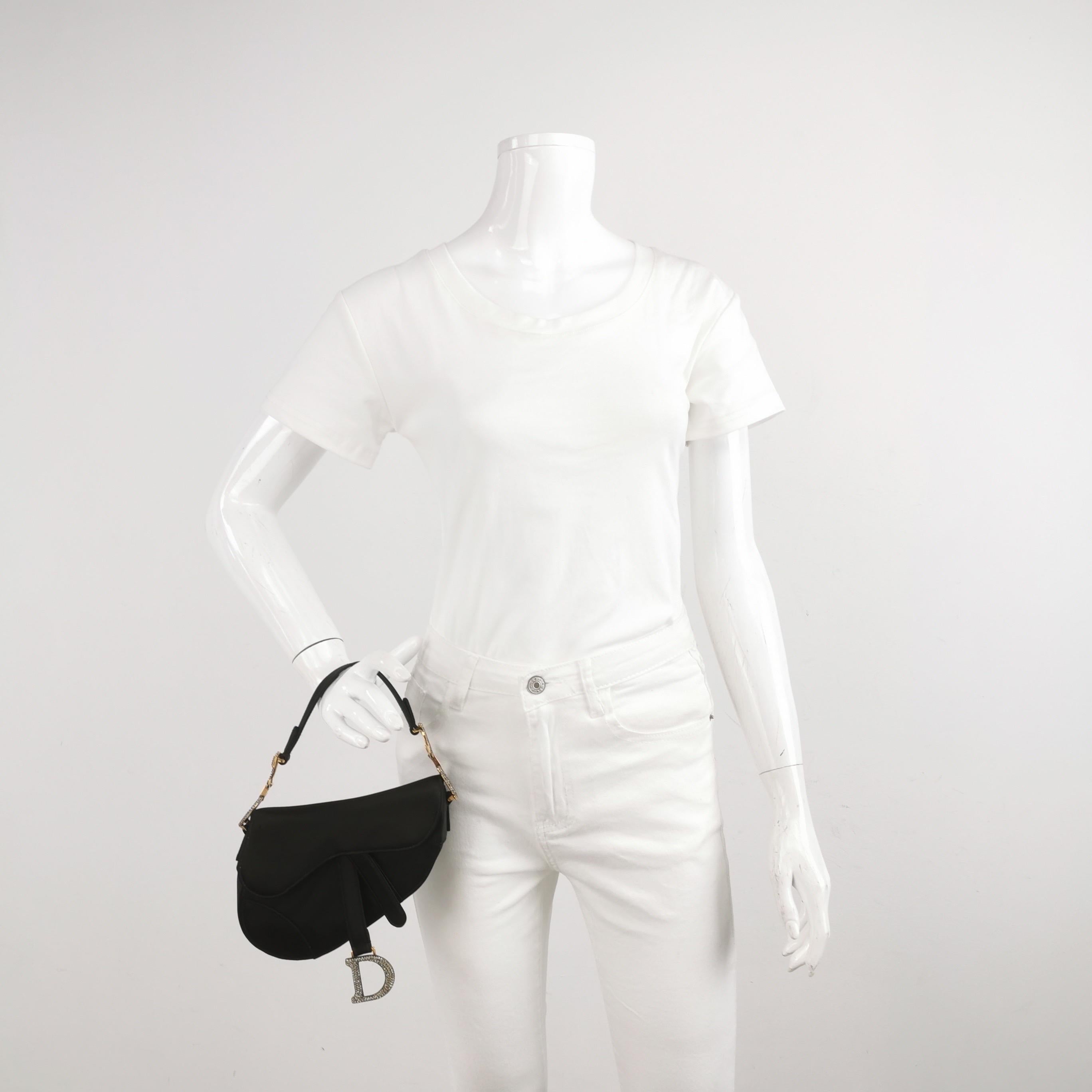 Dior Saddle Mini Silk Blue Grey with Crystal Embedded Buckles
  These are professional photos of the actual bag offered by Luxbags.
  Dior Saddle bag, crafted in blue silk satin, the legendary design comes in size mini, features a magnetic flap, and