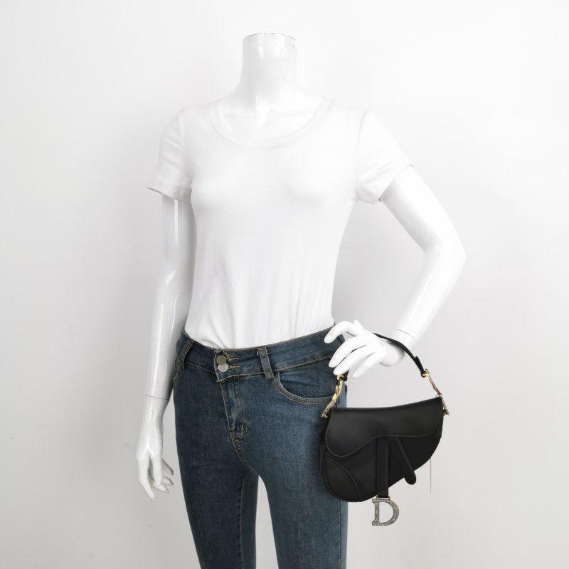 Dior Saddle Mini Silk Handbag Black with crystals
These are professional photos of the actual bag.
2019 Dior Saddle bag, crafted in black silk satin, the legendary design comes in size mini, features a magnetic flap, and bedazzling crystal