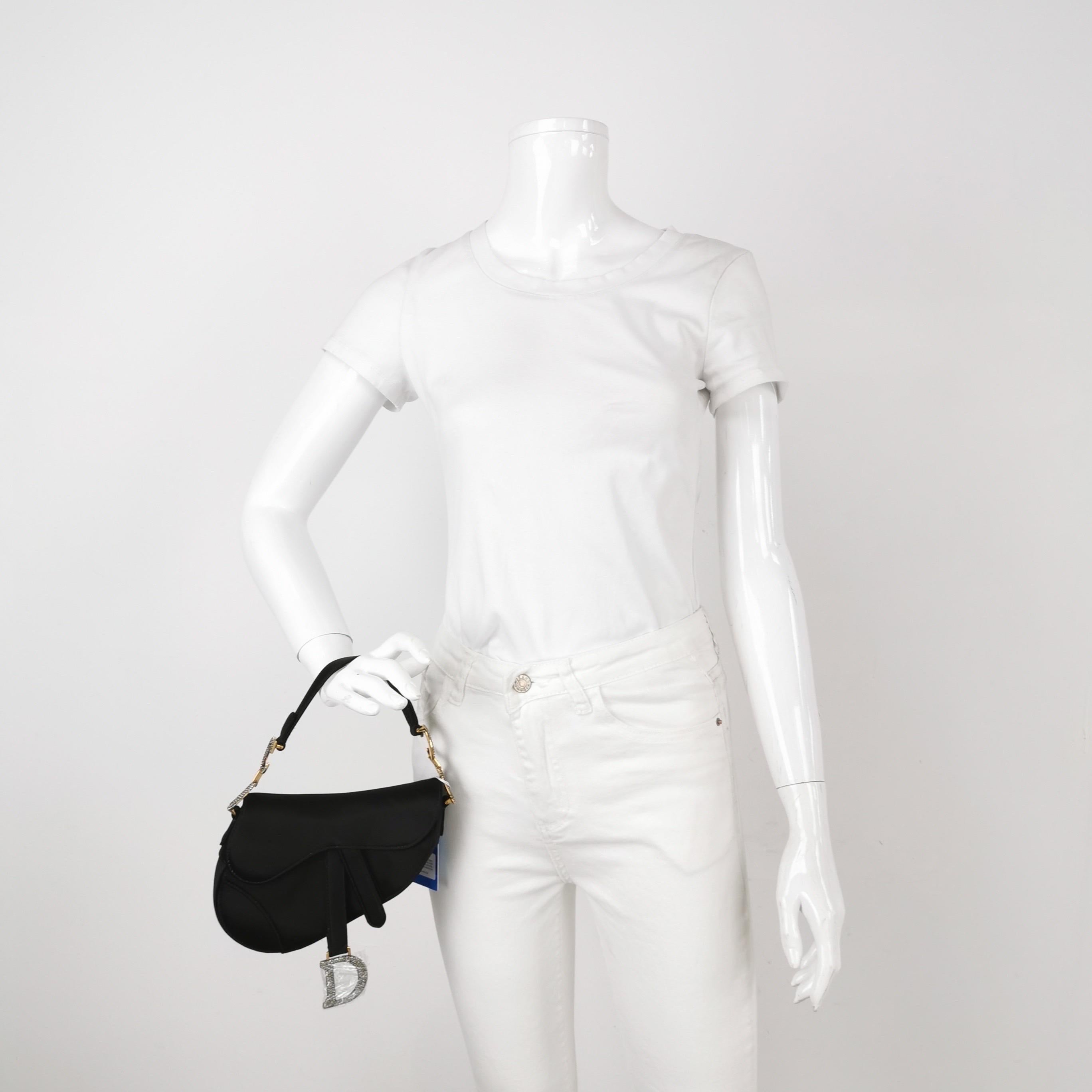 Dior Saddle Mini Silk Handbag Black with crystals
These are professional photos of the actual bag.
2019 Dior Saddle bag, crafted in black silk satin, the legendary design comes in size mini, features a magnetic flap, and bedazzling crystal