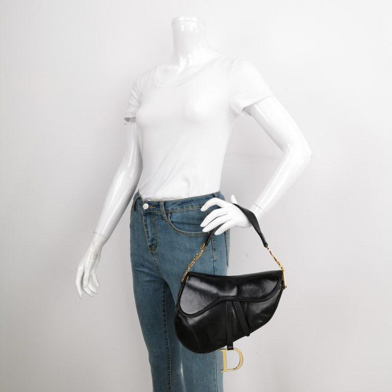 Dior Saddle Vintage 2000 Goatskin Leather Black with Gold Hardware
 These are professional photos of the actual bag offered by Luxbags.
 CONDITION: VERY GOOD
 Light signs of use. Scratches on leather and hardware. Light stains. 
 DETAILS
 
 Year