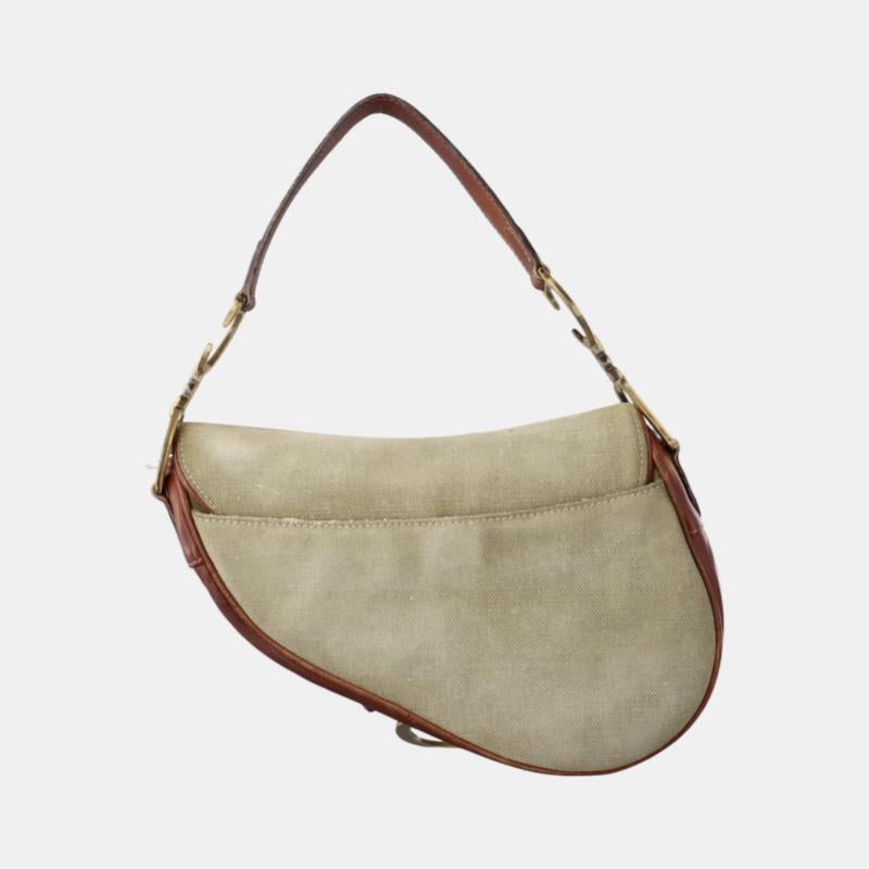 Dior Saddle Vintage Khaki Canvas with Brown Leather Gold Hardware
 These are professional photos of the actual bag offered by Luxbags.
 Condition: GOOD CONDITION
 Moderate to heavy signs of use. Stains on the exterior and interior. Cracks on the