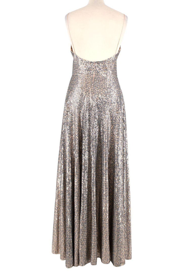 Dior Sequin Embellished Silk Low back Gown

- Luxurious silk bodied and lined gown
- Dark silver, translucent and champagne gold sequins
- Dark grey stitching 
- Nude silk thin straps
- Elegant low back
- Flattering V-neckline with tailored darts on
