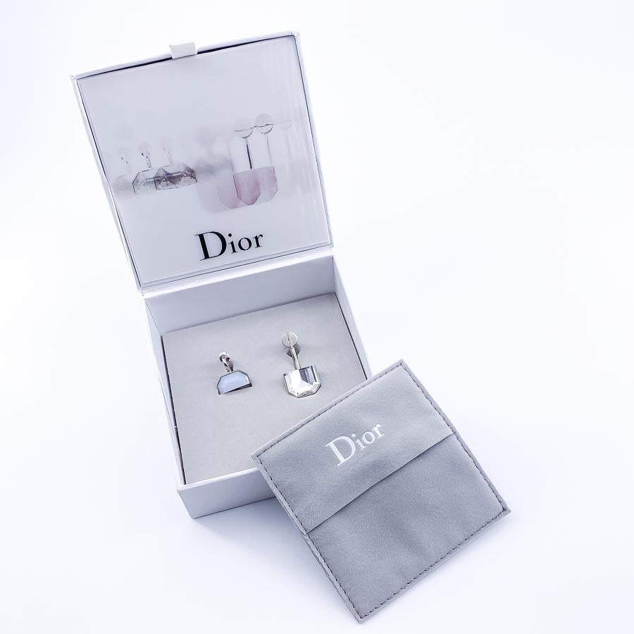 The earrings are from the 2015 Cruise fashion show during which Maison DIOR introduces separable jewelry to mix with each other: the DIOR SET line. The earrings are studs to wear on the same ear or separately. On one is set a brilliant crystal which