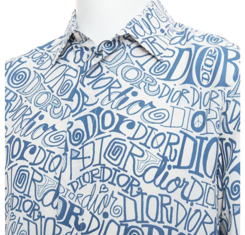 DIOR Shawn Stussy blue graffiti swirl logo print button down shirt EU38 S
Reference: YIKK/A00168
Brand: Dior
Collection: Shawn Stussy
Material: Viscose
Color: Blue, Cream
Pattern: Graffiti
Closure: Button
Extra Details: The fine artistry of this
