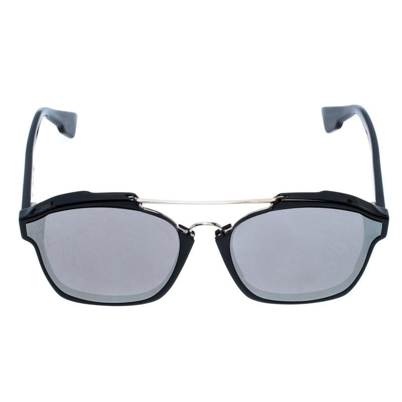 Super cool and stylish, these sunglasses from Dior will be your best companion whenever you are heading out. Rendered in a black-coloured acetate frame, these Abstract sunnies are styled in a wayfarer silhouette and have broad grey lenses and