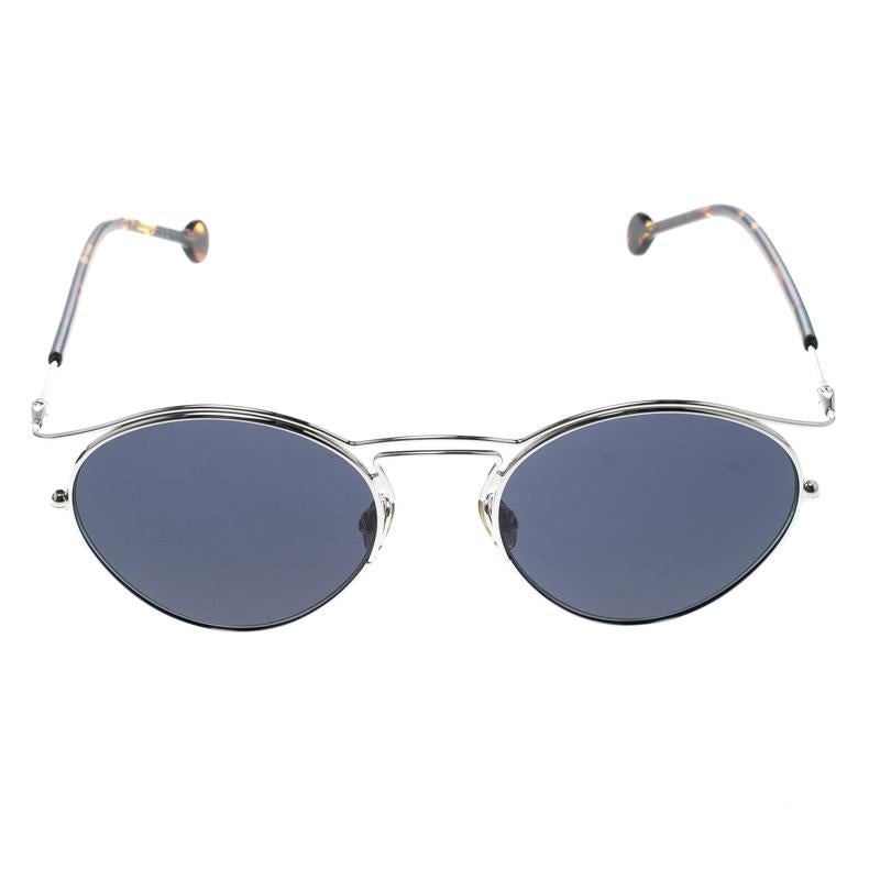 Dior never fails to create lush accessories, and these oval sunglasses are no exception. These 8JDKU Dior Origins 1 sunglasses are a classic pair with an edge. They are crafted from acetate and silver-tone metal and feature blue lenses. The