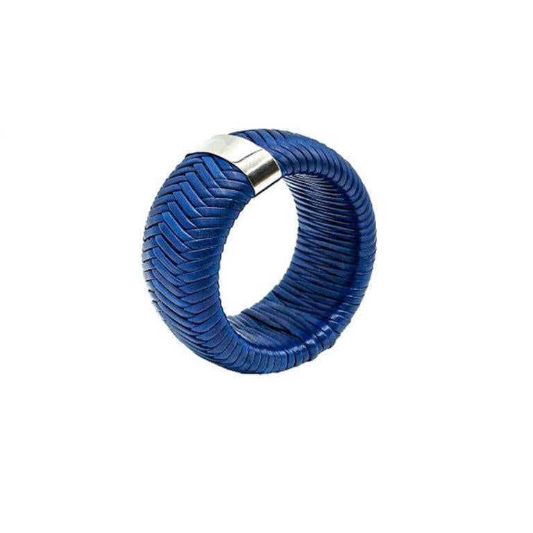 A gigantic, jumbo Dior Blue Leather Weave Bangle. Crafted in electric blue woven leather with a chromed band and finished with the name of Dior. In very good condition, 6cms inner diameter. A stunning jumbo sized bangle from the House of Dior that