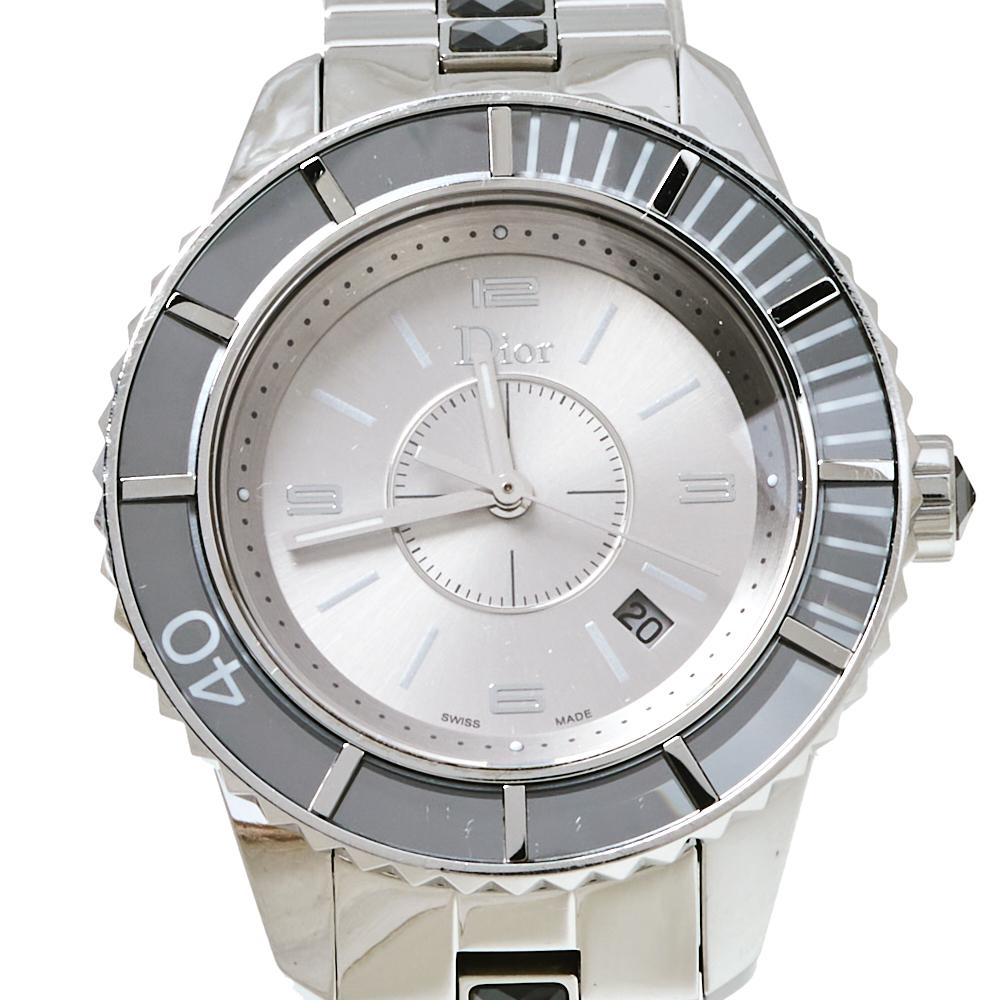 Here's a timepiece to not only assist you with the correct time but also elevate your style quotient. This Dior watch is from their Christal collection, and it is Swiss made. It is made from sapphire crystal and stainless steel. The silver-grey dial