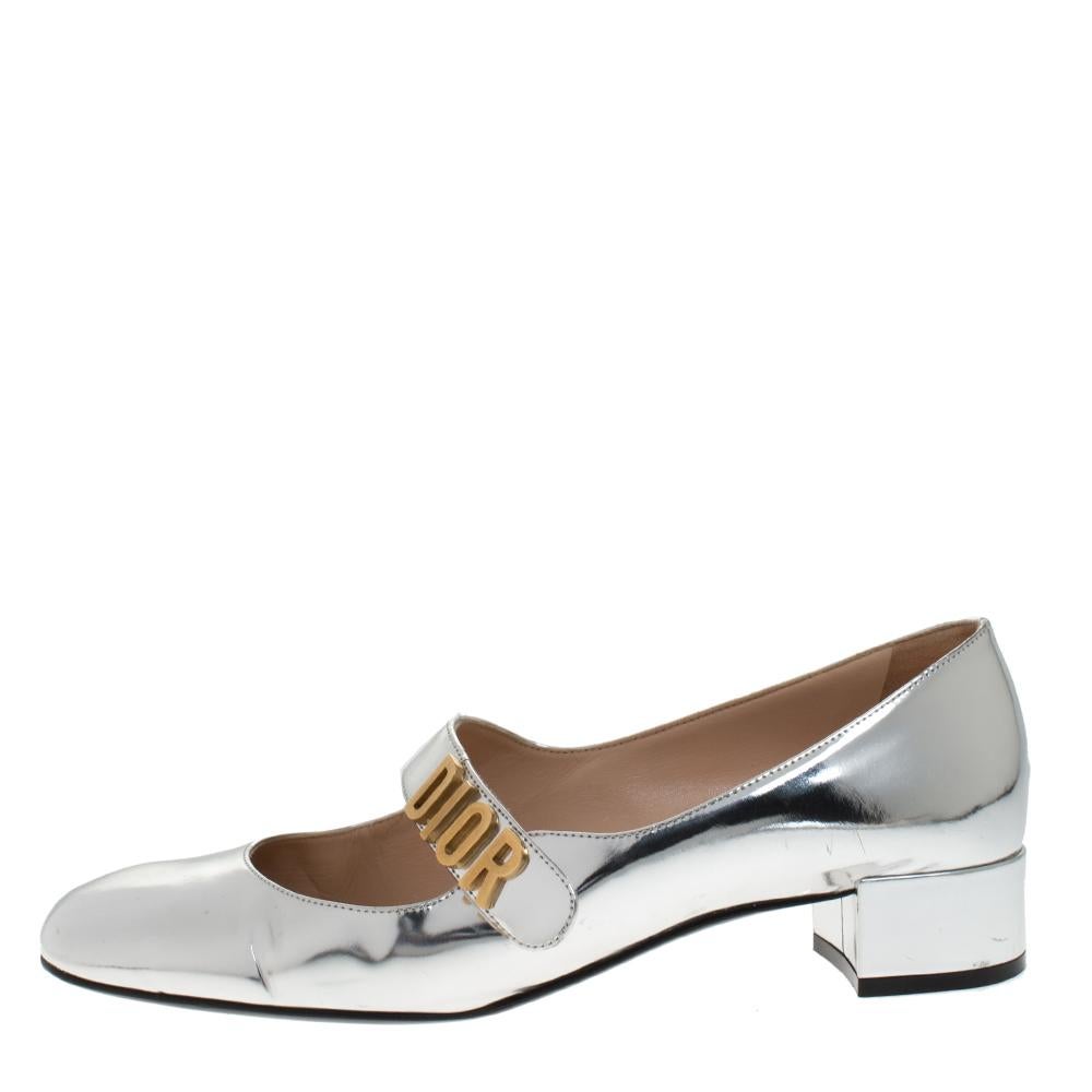 A gorgeous pair of pumps from the house of Dior to highlight your fabulous styling choices. Match your outfit with these silver laminated leather of these pumps and complete your look. This pair features square toes and DIOR on the straps.

