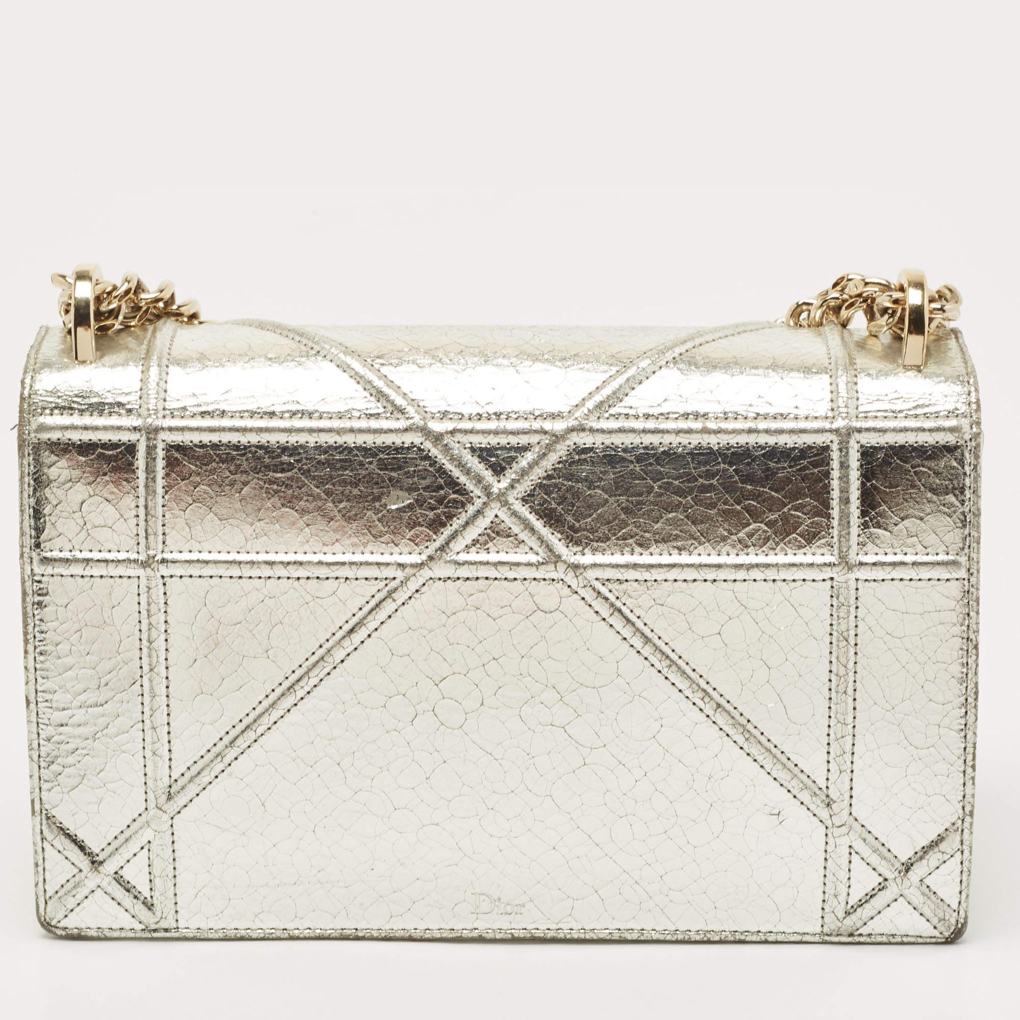 Introduced in Spring/Summer 2015 runaway, the Diorama embodies refined construction and celebrates femininity through its artistic design. The signature Cannage pattern brings out the appeal of this Dior bag. Made from leather, the chain-leather